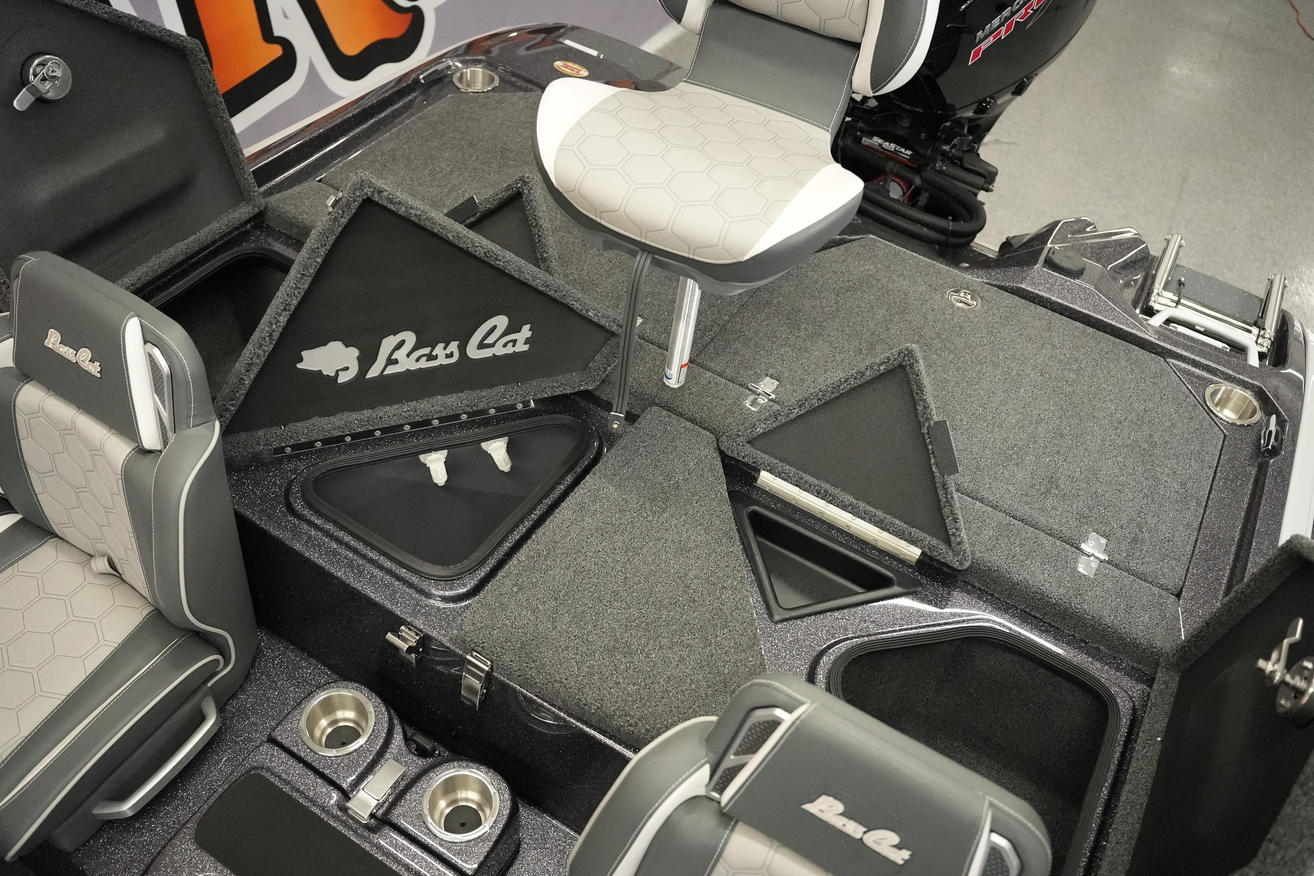 2026 Bass Cat Puma STS boat interior with seating and storage compartments.
