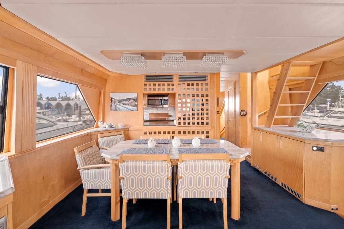 Luxurious interior of a 1996 Forbes Cooper 73 yacht with elegant dining area.