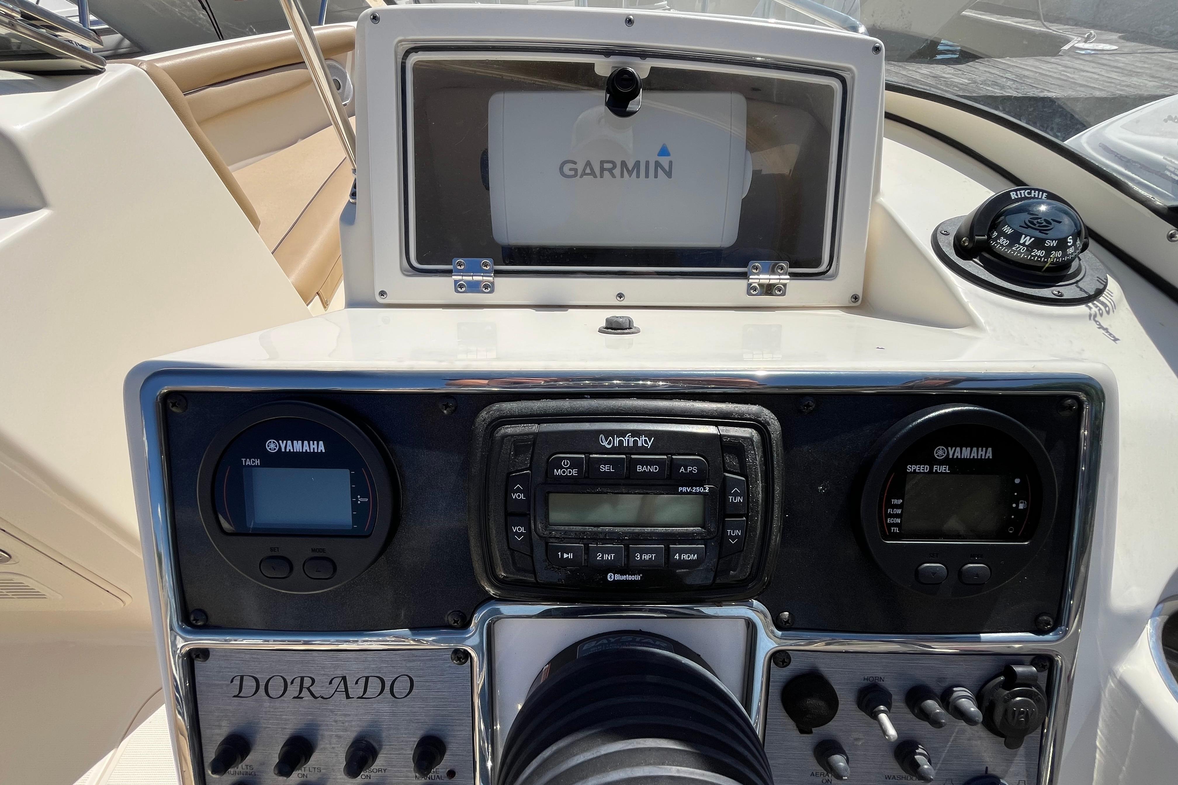 Control panel of a 2017 Scout 210 Dorado boat with Garmin and Yamaha instruments.