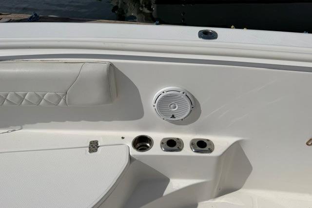 2014 Edgewater 318CC boat interior with speaker and cup holders.