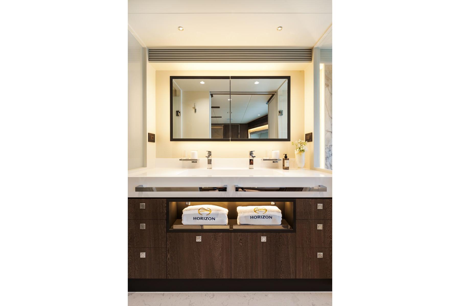 Modern bathroom vanity with mirror, Horizon FD80 2026 model, featuring elegant design and lighting.