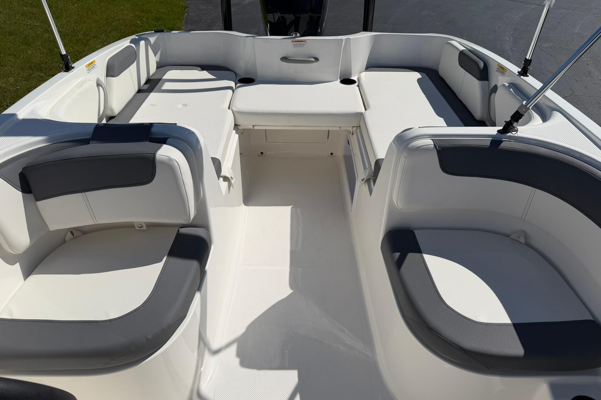 2026 Bayliner Element E18 boat interior with spacious seating and modern design.