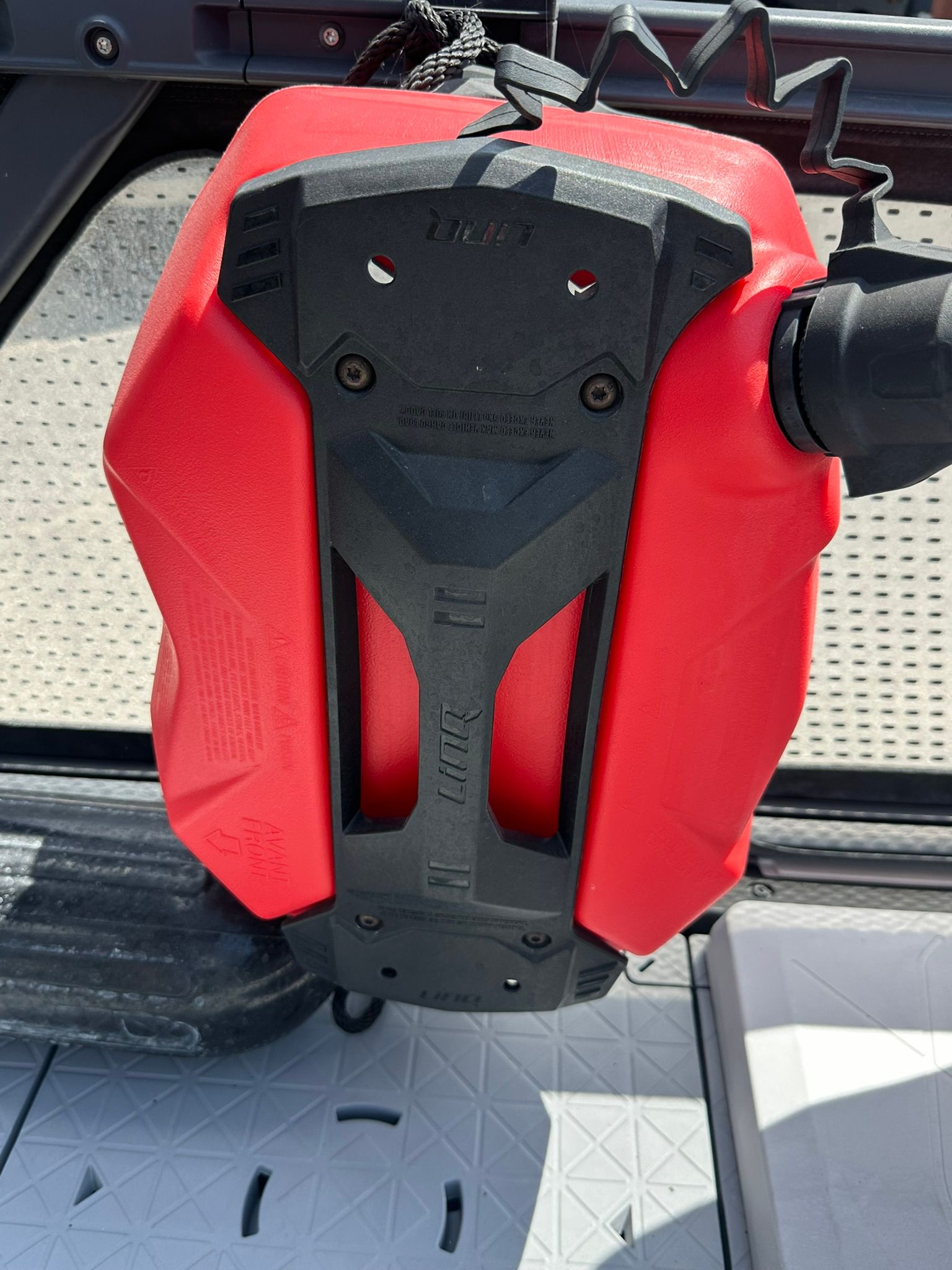 A red fuel canister is secured on a Sea-Doo 21 SWITCH SPORT.