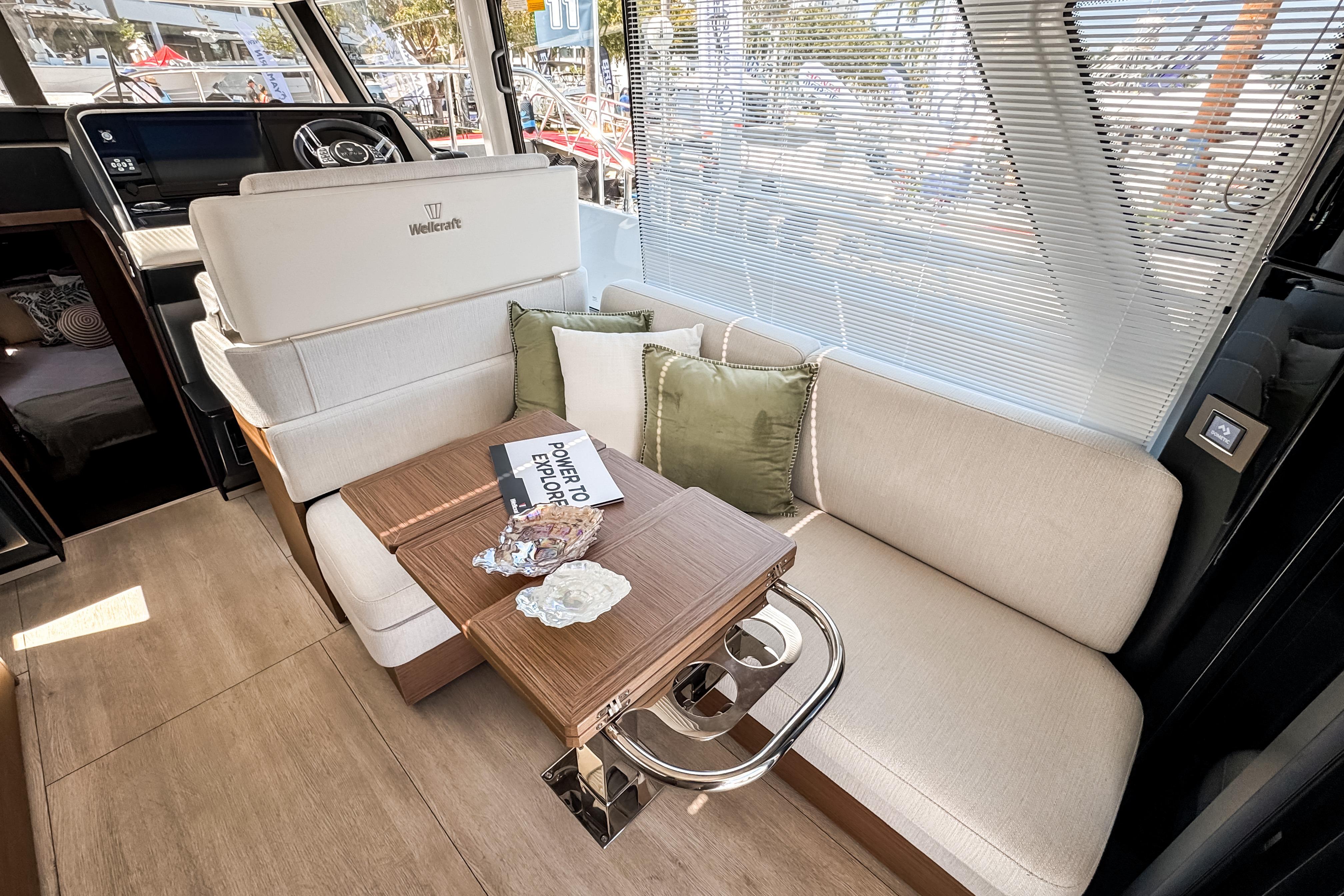 Interior of 2026 Wellcraft 44 Explorer featuring cozy seating area.