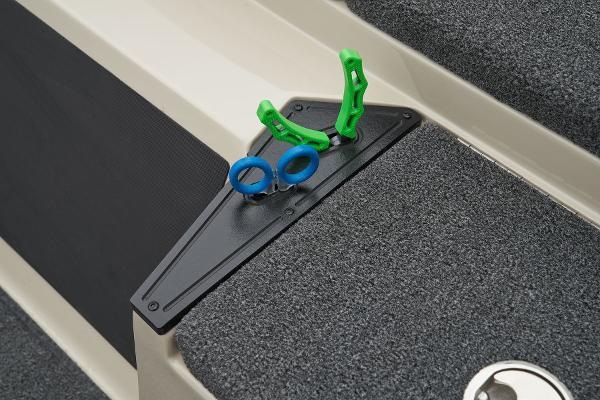 Manufacturer Provided Image: 2026 Ranger Z185 boat deck with green and blue clips on a textured surface.