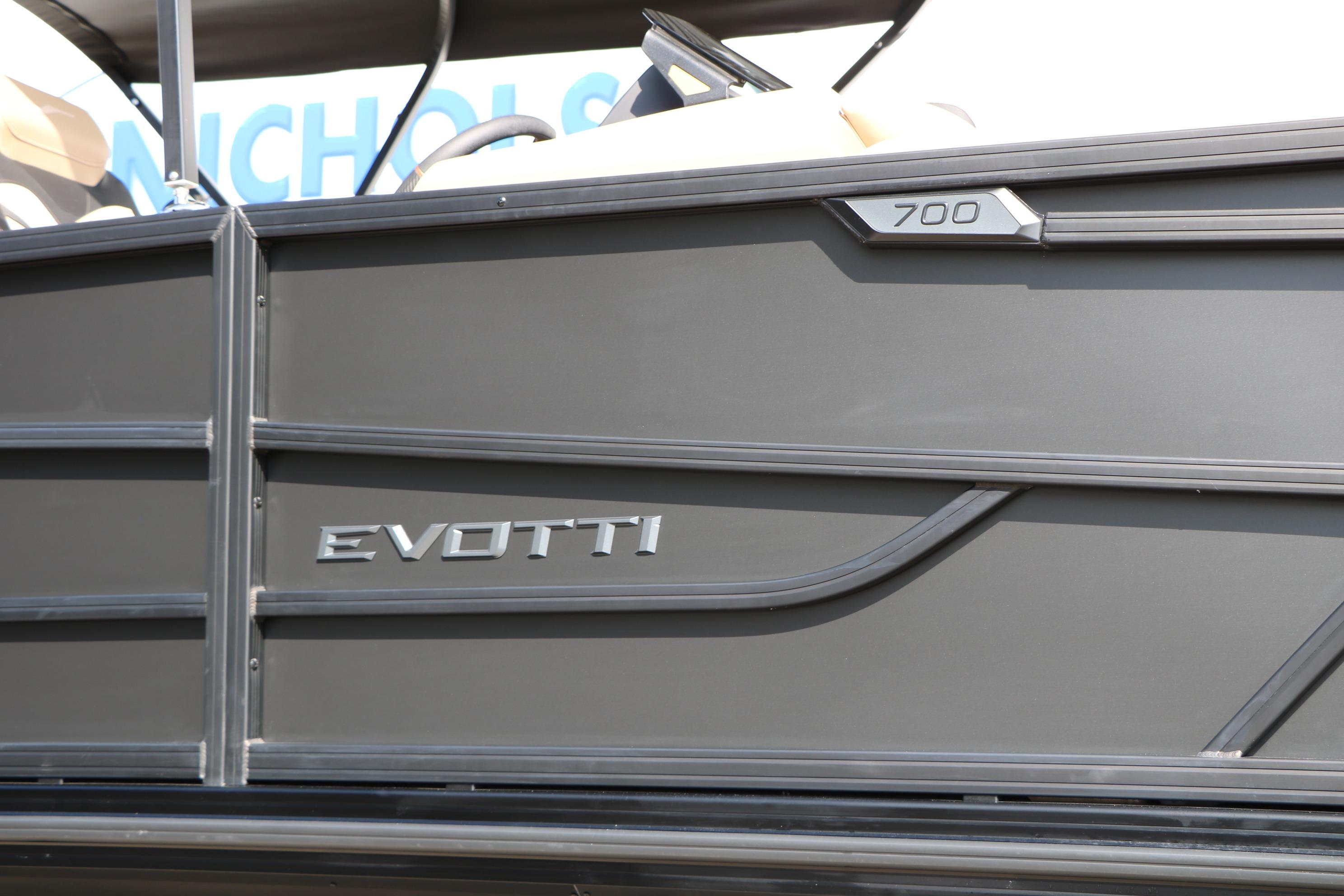 Evotti 723CS 2026 boat side view with sleek design and branding.