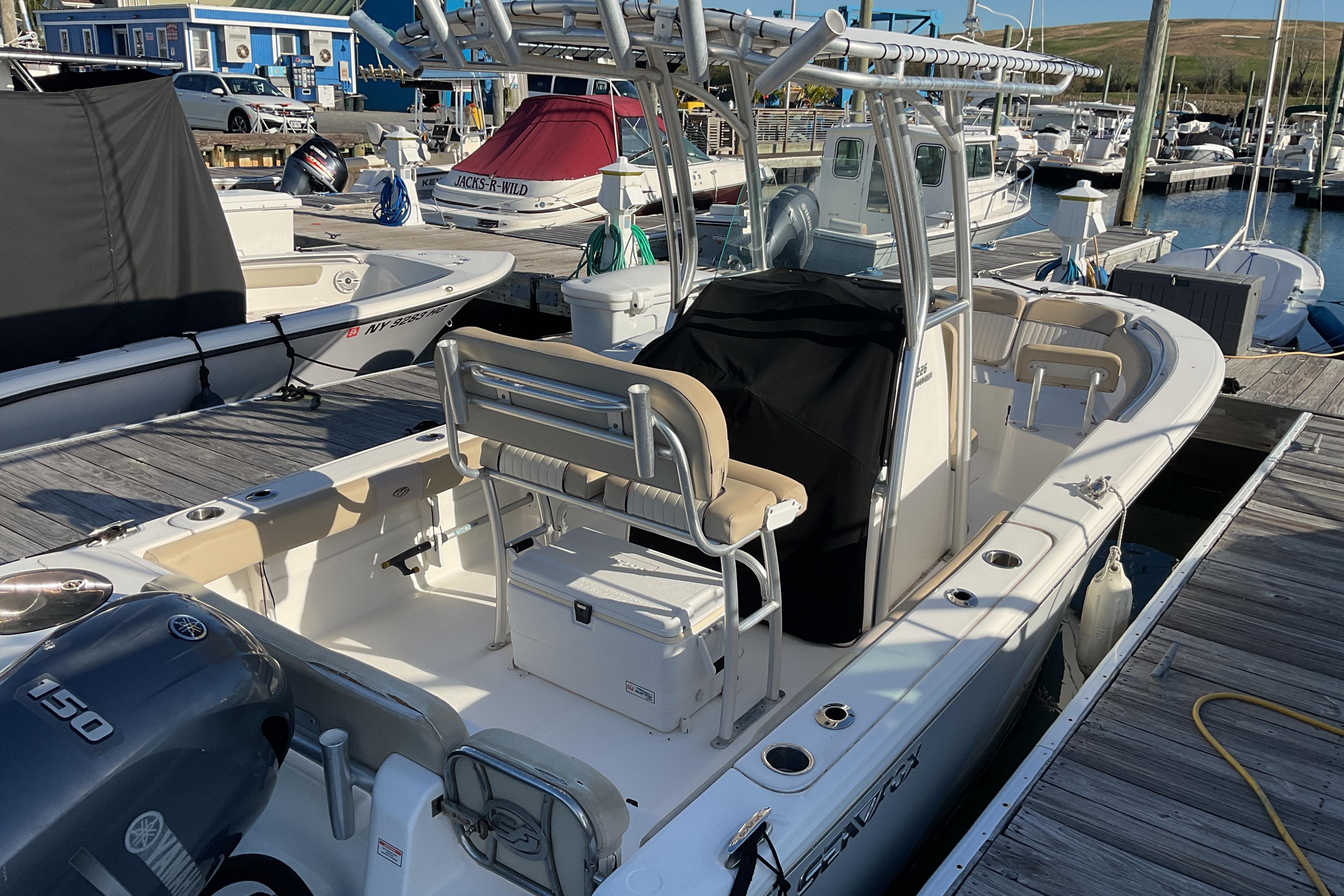 2016 Sea Fox 226 Commander boat docked at marina with Yamaha engine.