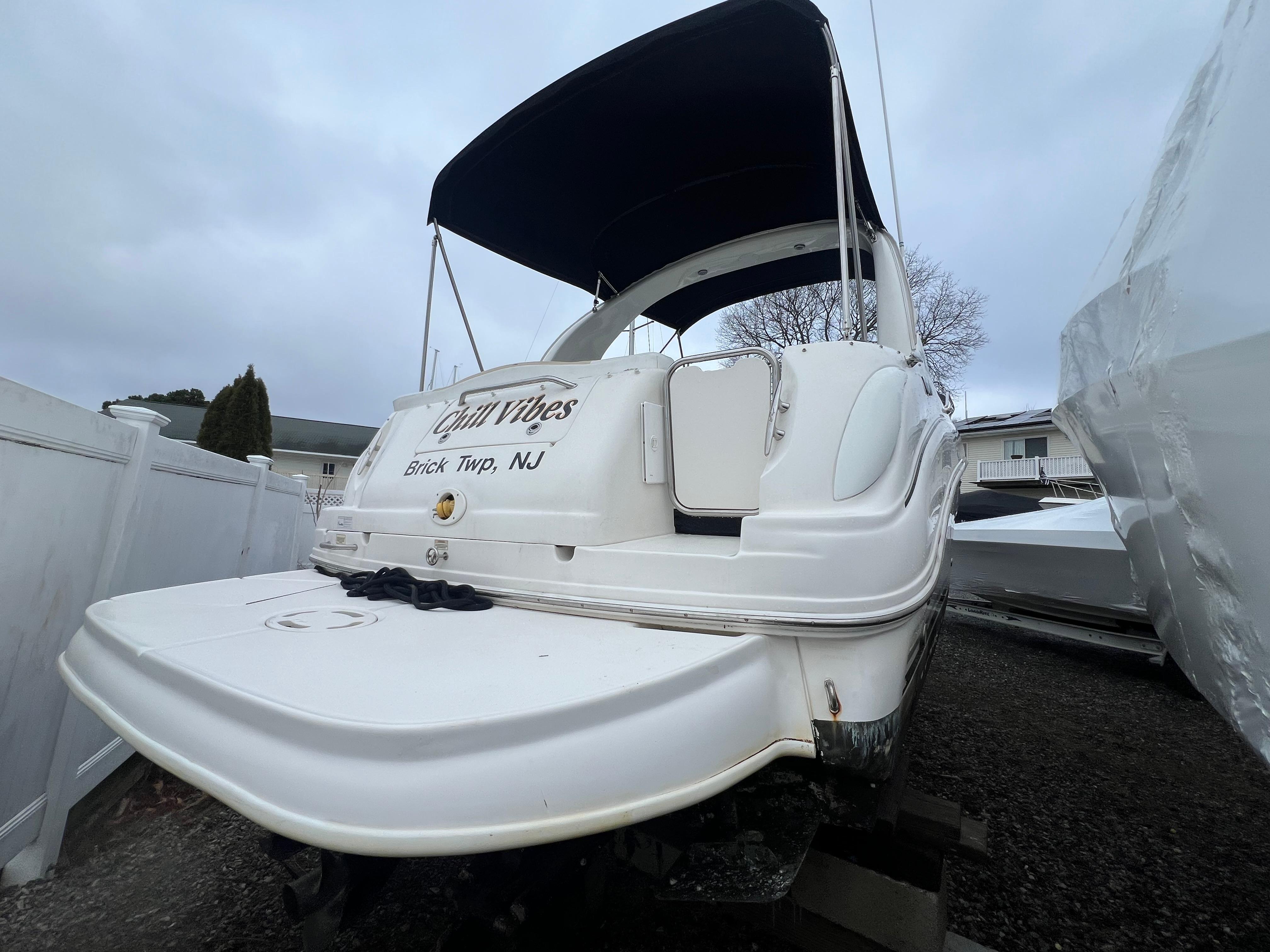 2008 Sea Ray 280 Sundancer boat with canopy, docked in Brick Township, NJ.