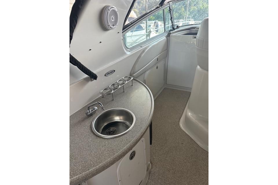 2003 Four Winns 378 Vista boat interior with sink and countertop.