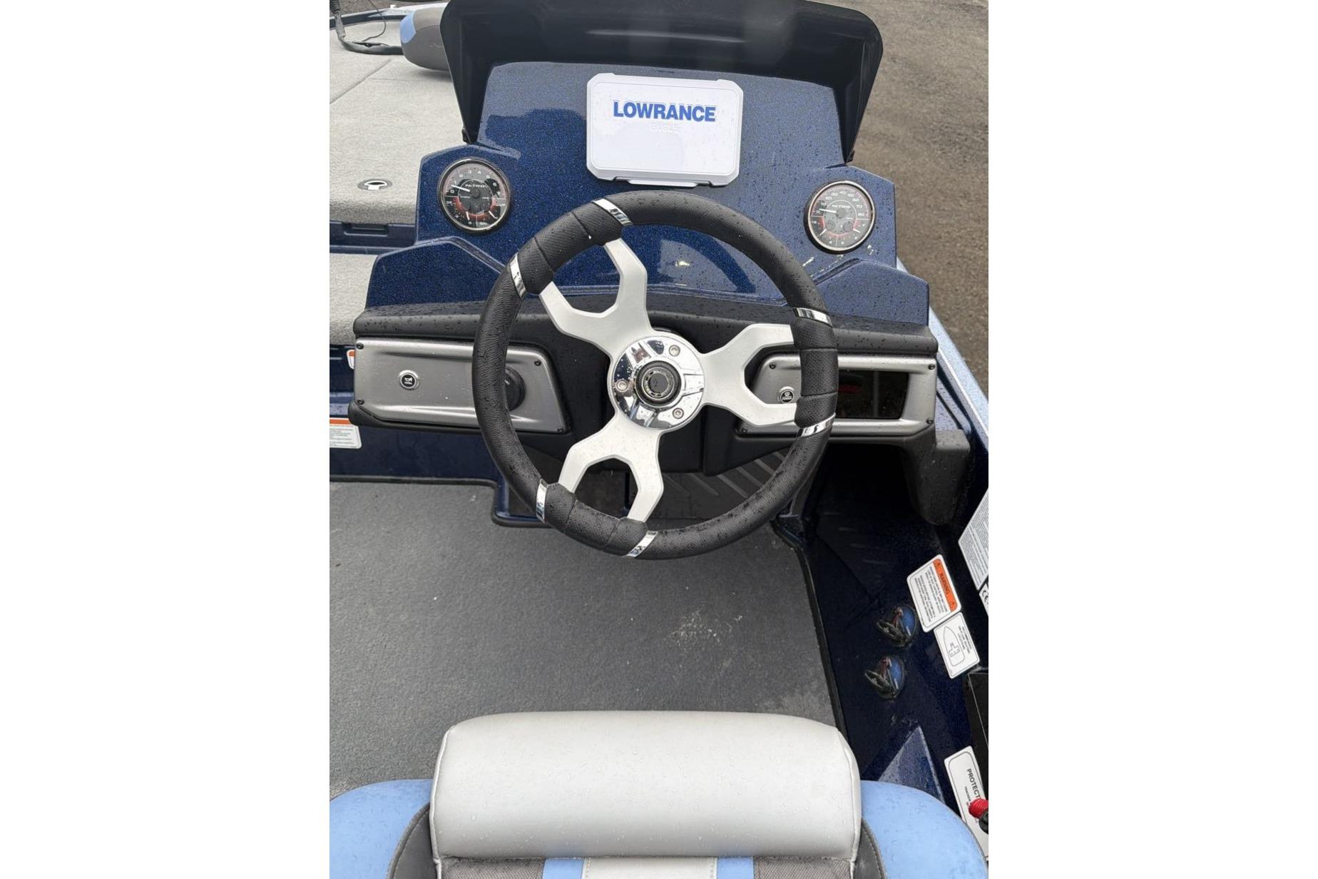 Steering wheel of 2026 Nitro Z20 XL boat with Lowrance display.