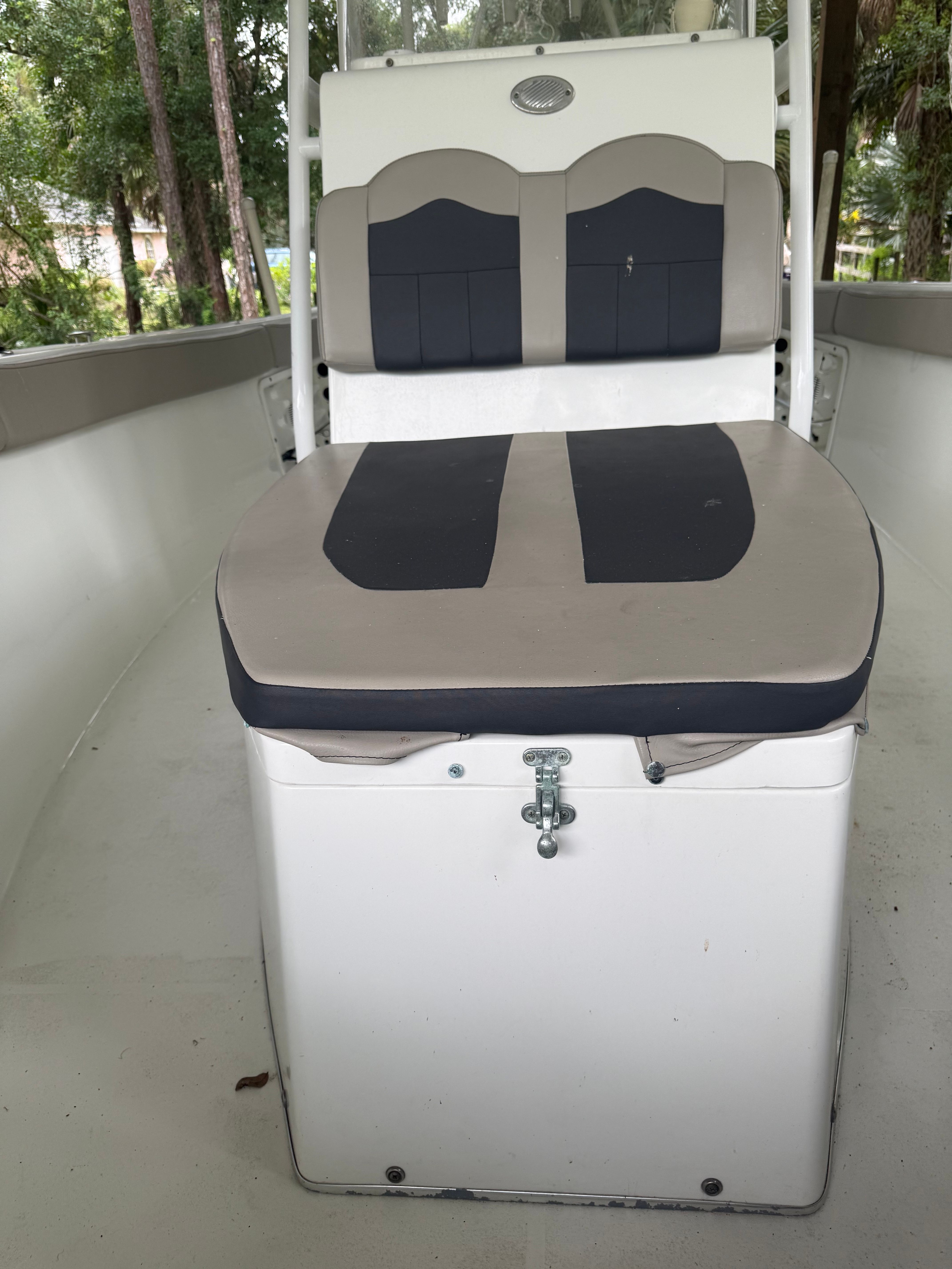 The image shows the cockpit of a 2021 Clearwater 2508 Center Console boat.
