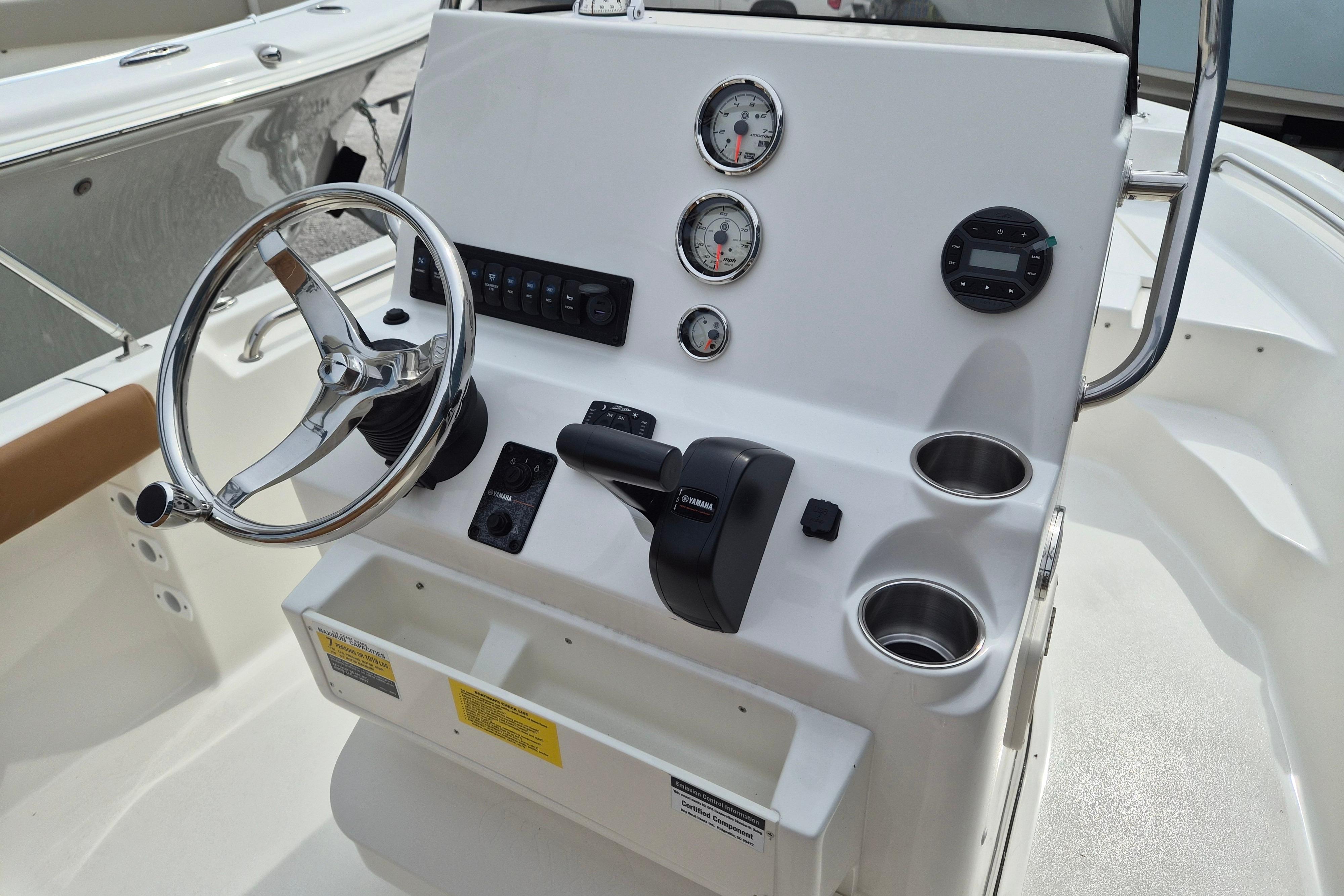 Steering console of 2026 Key West 189 FS boat with gauges and controls.