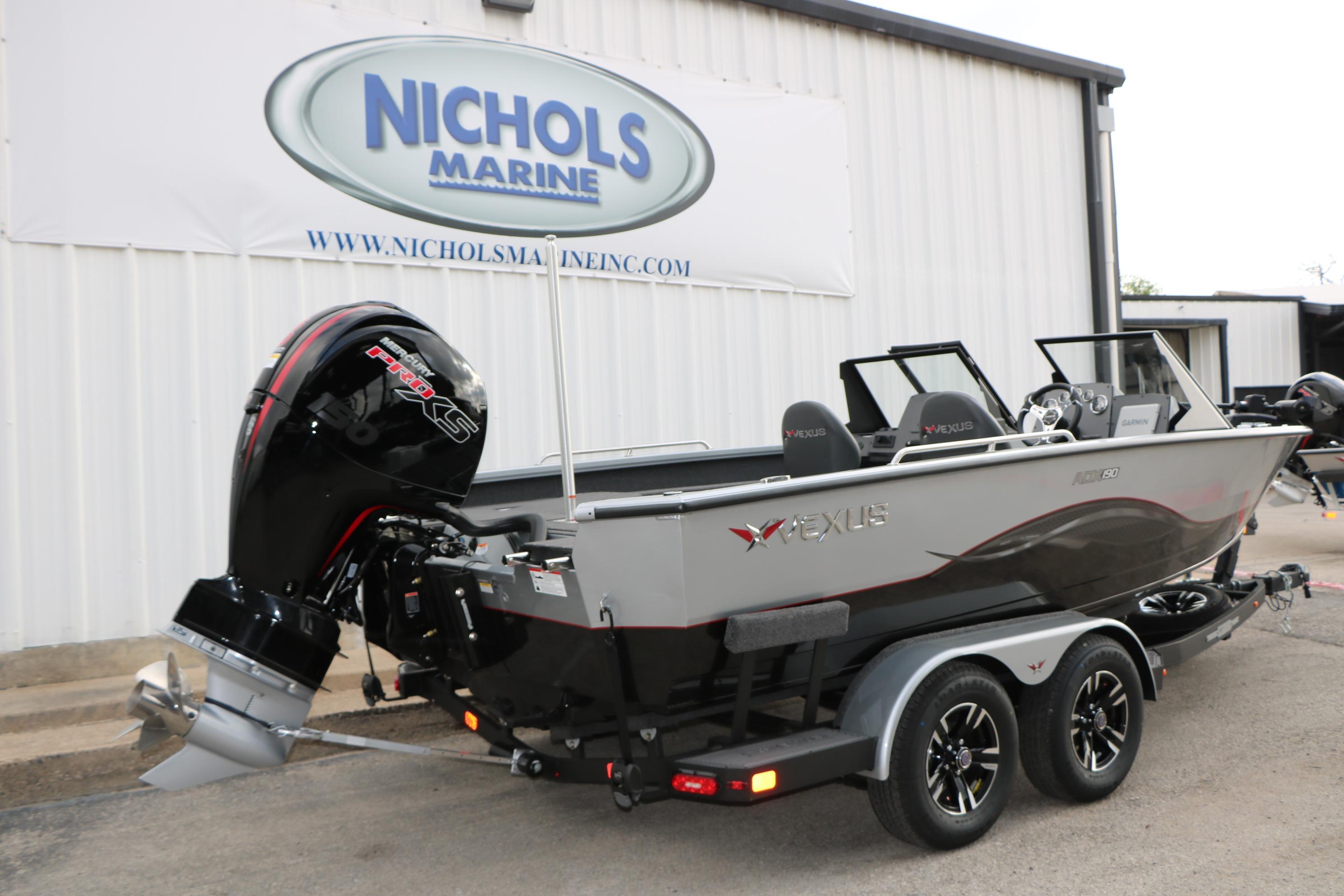2026 Vexus ADX 190 boat at Nichols Marine, featuring powerful outboard motor.