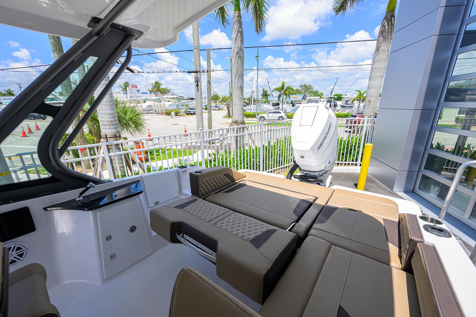 2026 Monterey Elite 27 OB boat interior with luxurious seating and modern design.