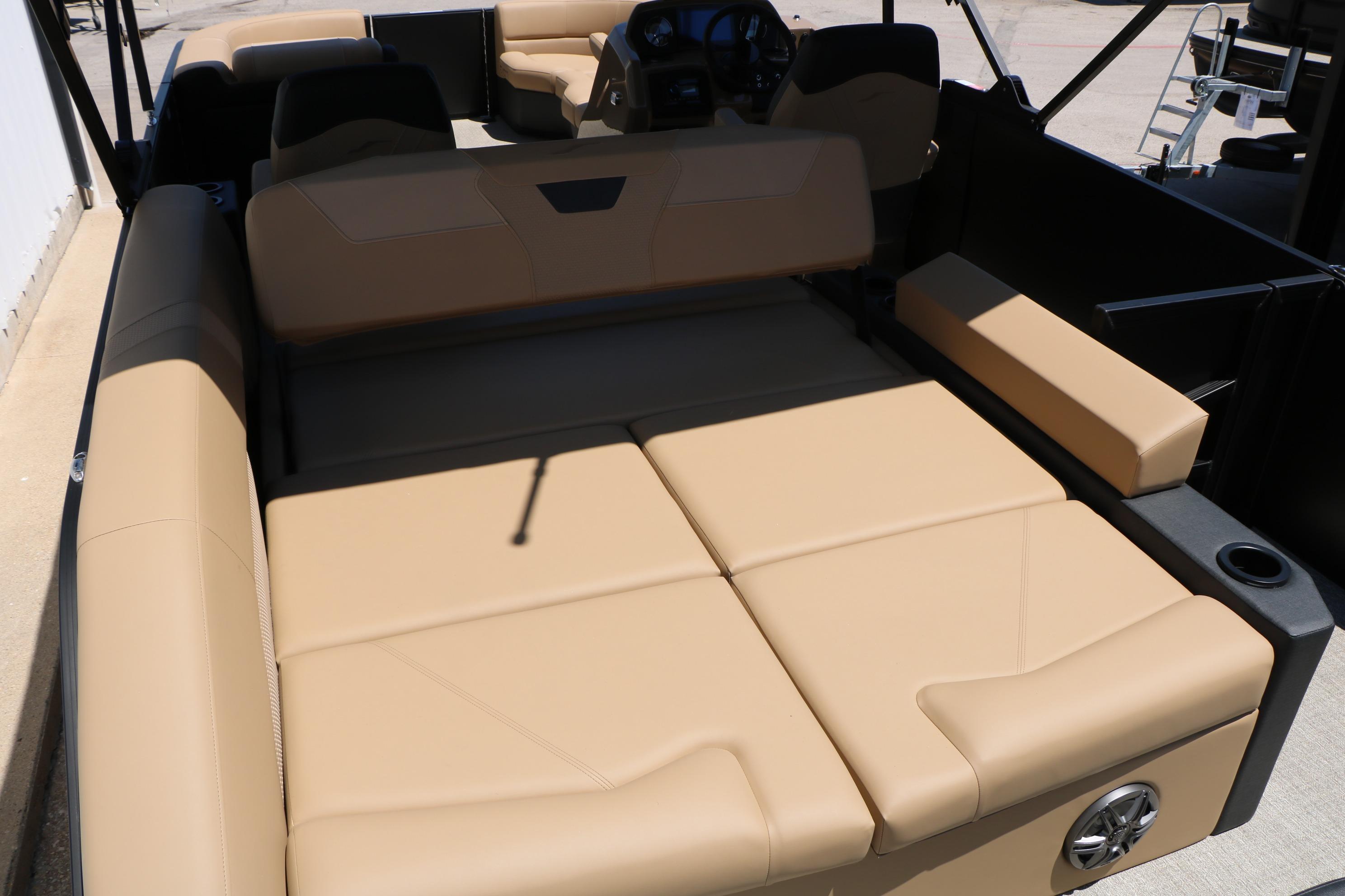 Luxurious beige seating in 2026 Evotti 521CS boat interior, showcasing comfort and style.