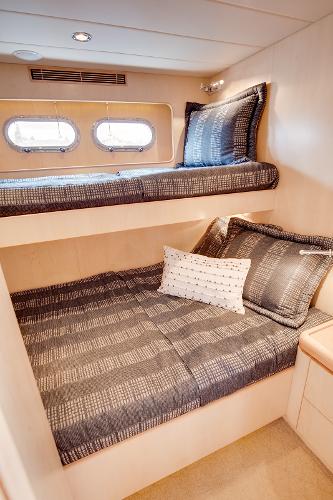 Interior of 2006 Horizon 82’ Cockpit Motoryacht with bunk beds.