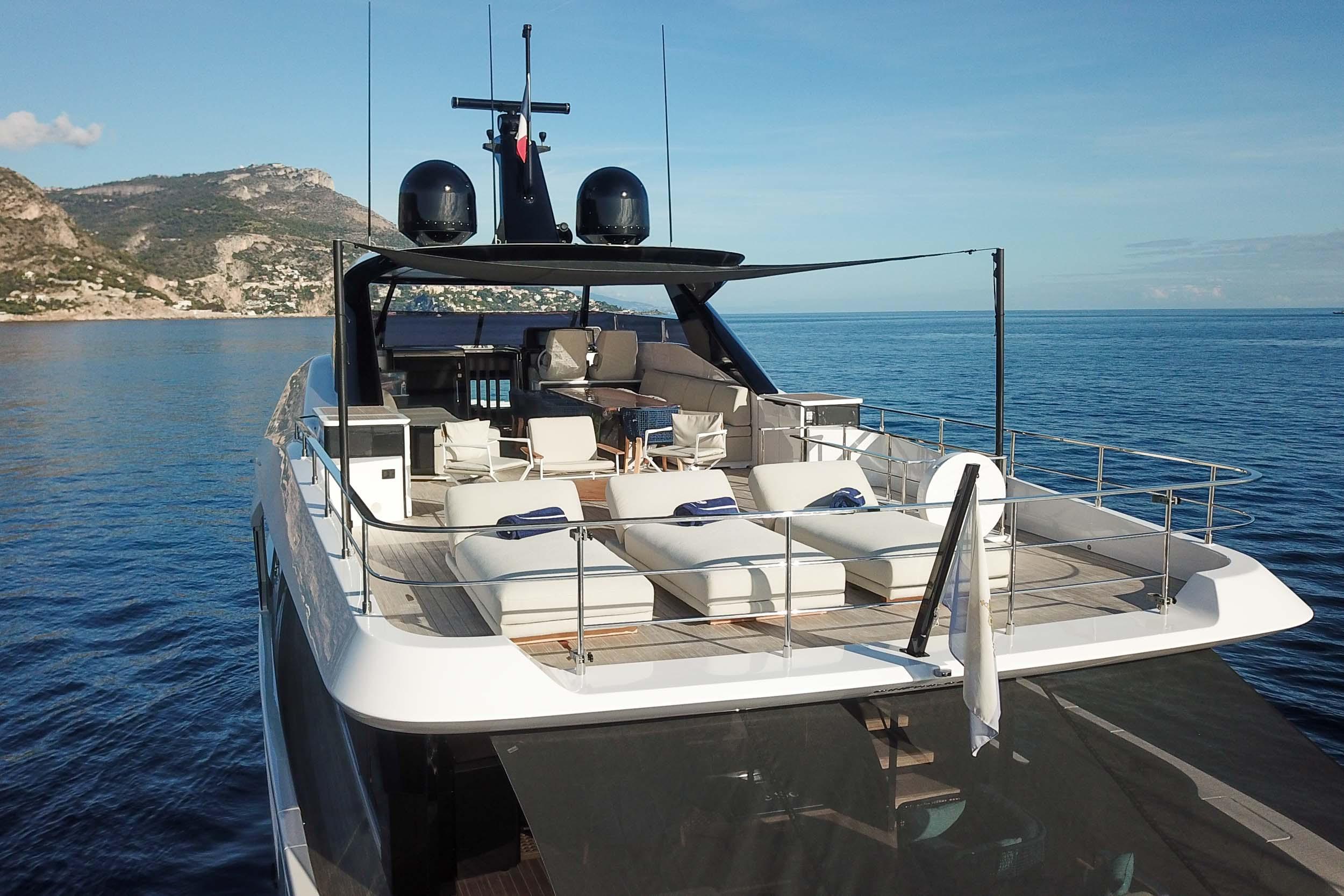 Luxurious 2025 Ferretti Yachts Infynito 80 cruising on serene blue waters.