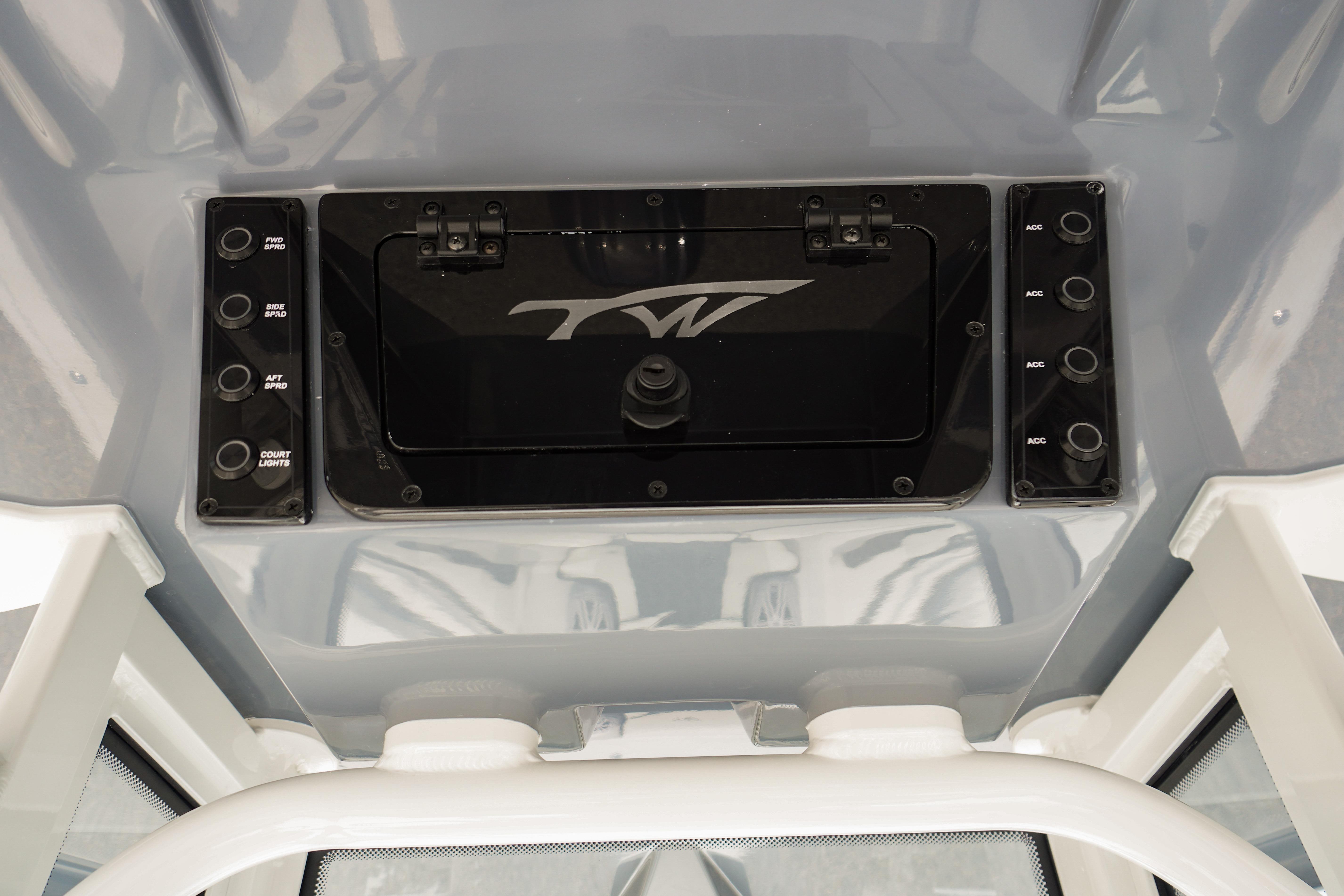 2027 Tidewater 220 CC Adventure boat dashboard with control panel and switches.