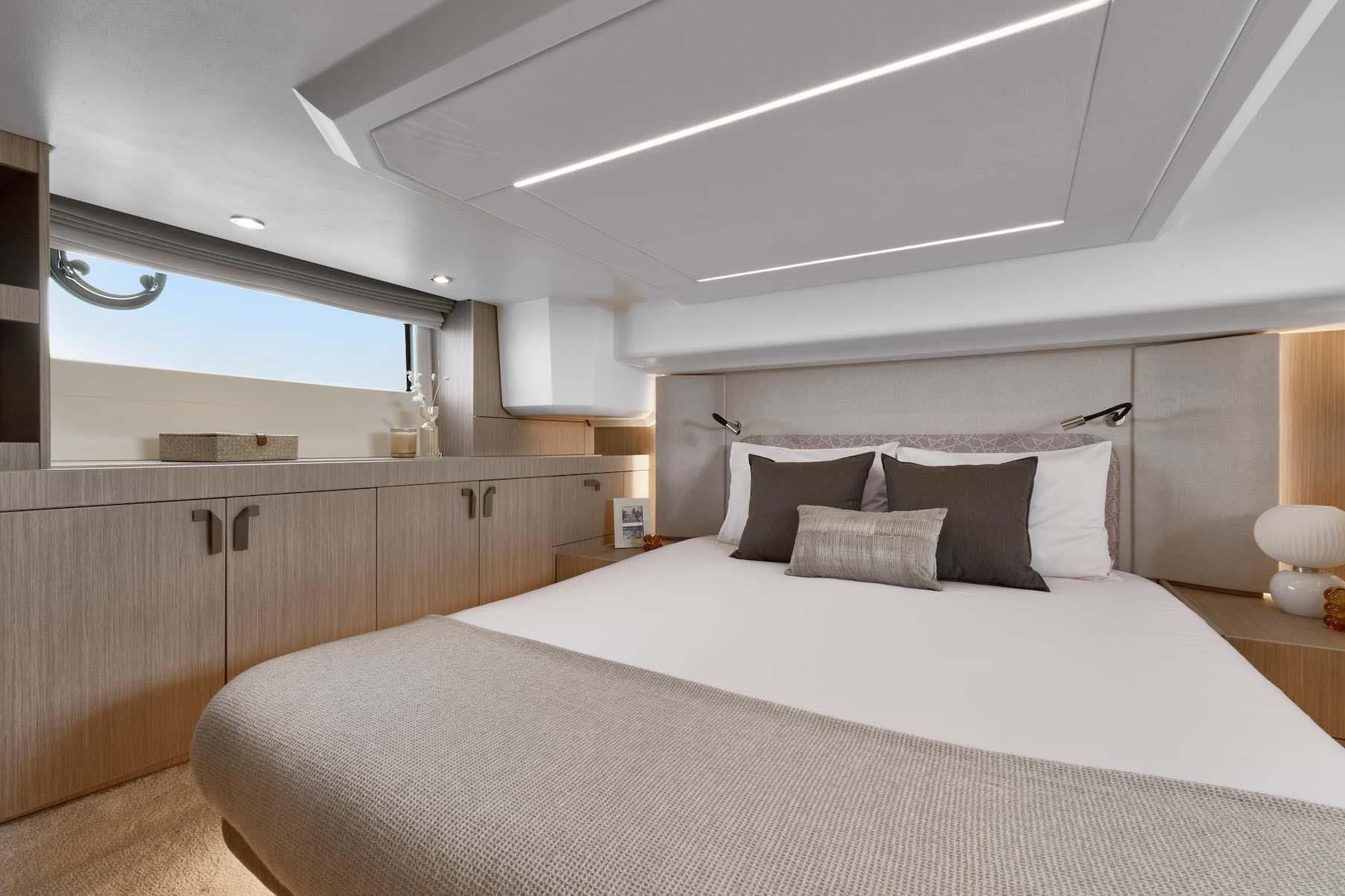 Manufacturer Provided Image: Luxurious bedroom interior of 2026 Prestige F4.3 yacht with modern design and elegant decor.