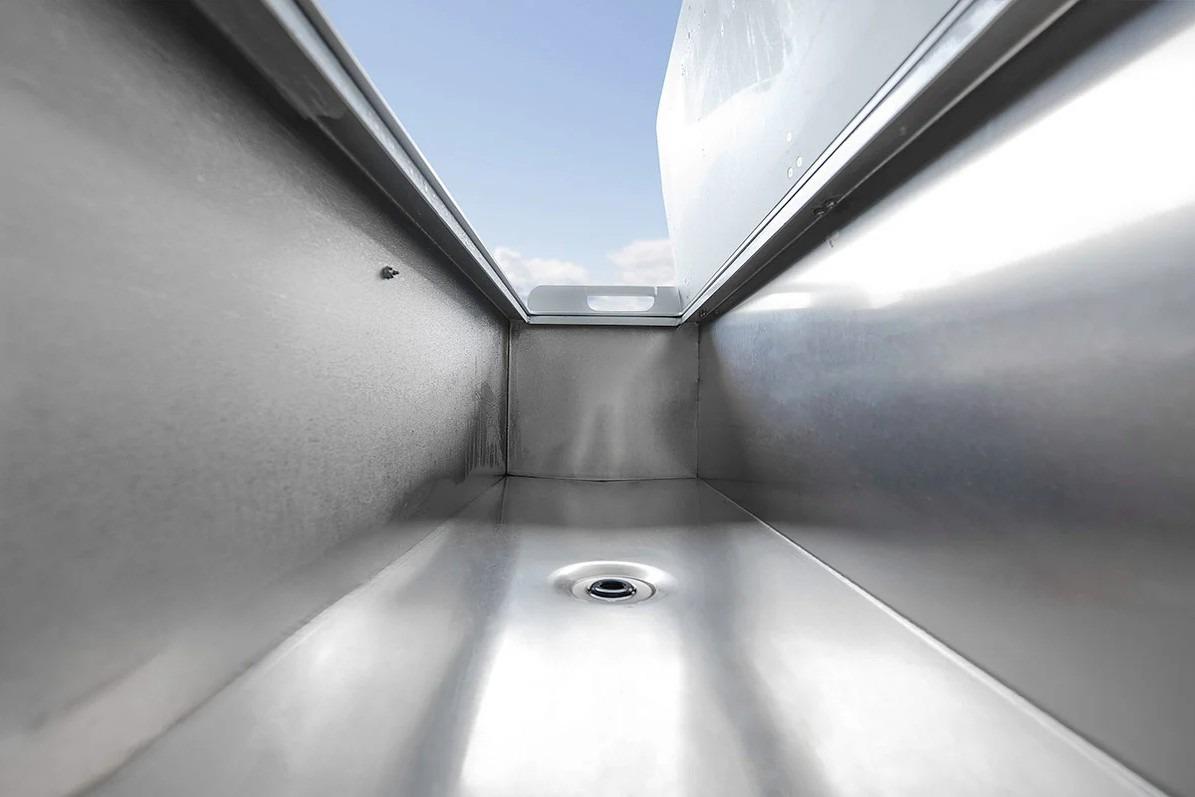 Interior view of KingFisher 3225 GFX Offshore boat, showcasing sleek metal finish, 2026 model.