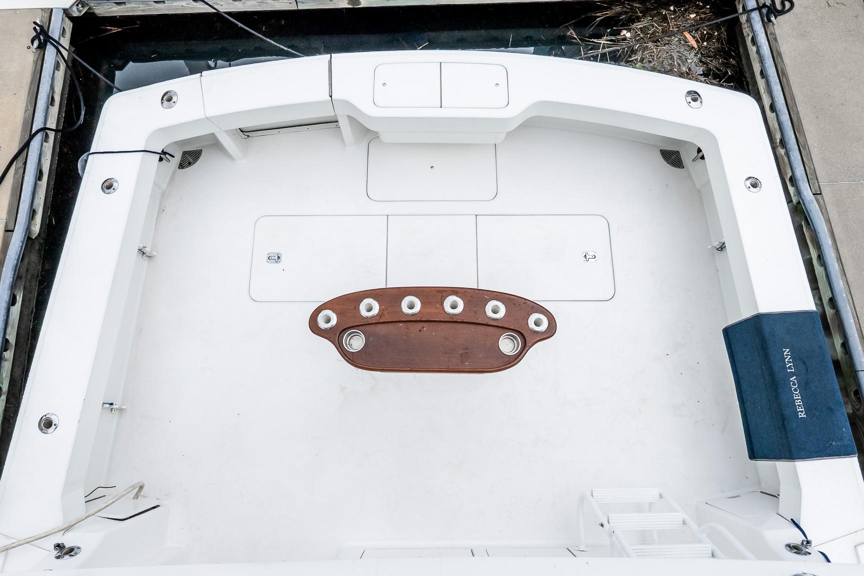 Cockpit of 2000 Viking 50' Convertible yacht with fishing rod holders.