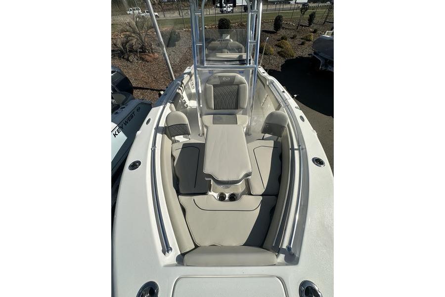 2026 Key West 219 FS boat interior with cushioned seating and center console.