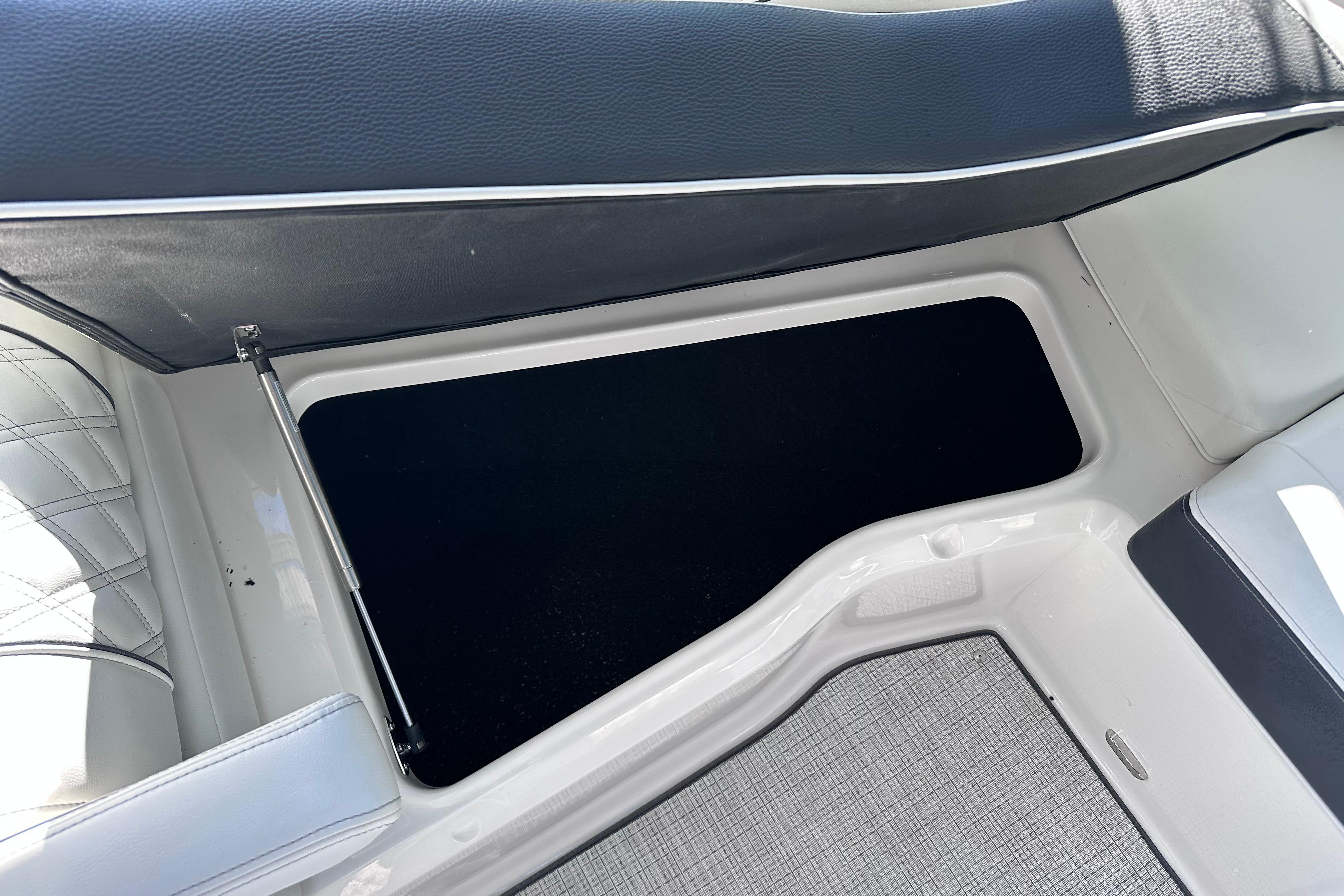 2026 Regal LX4 interior storage compartment with sleek design and modern upholstery.
