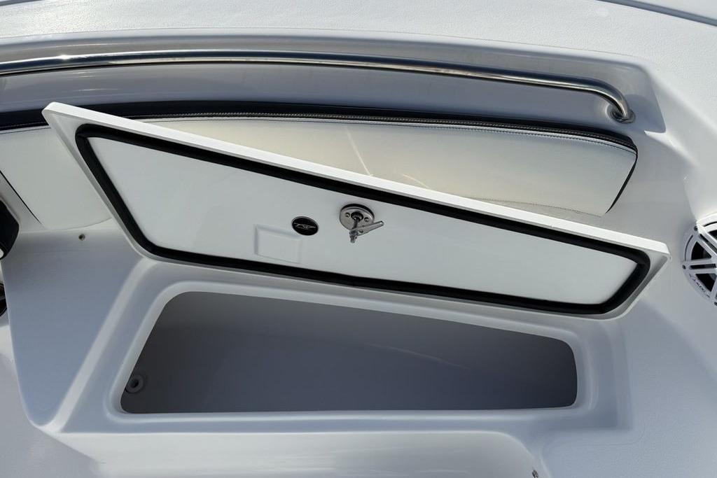 2026 Tidewater 198 CC Adventure boat storage compartment with open hatch and sleek design.