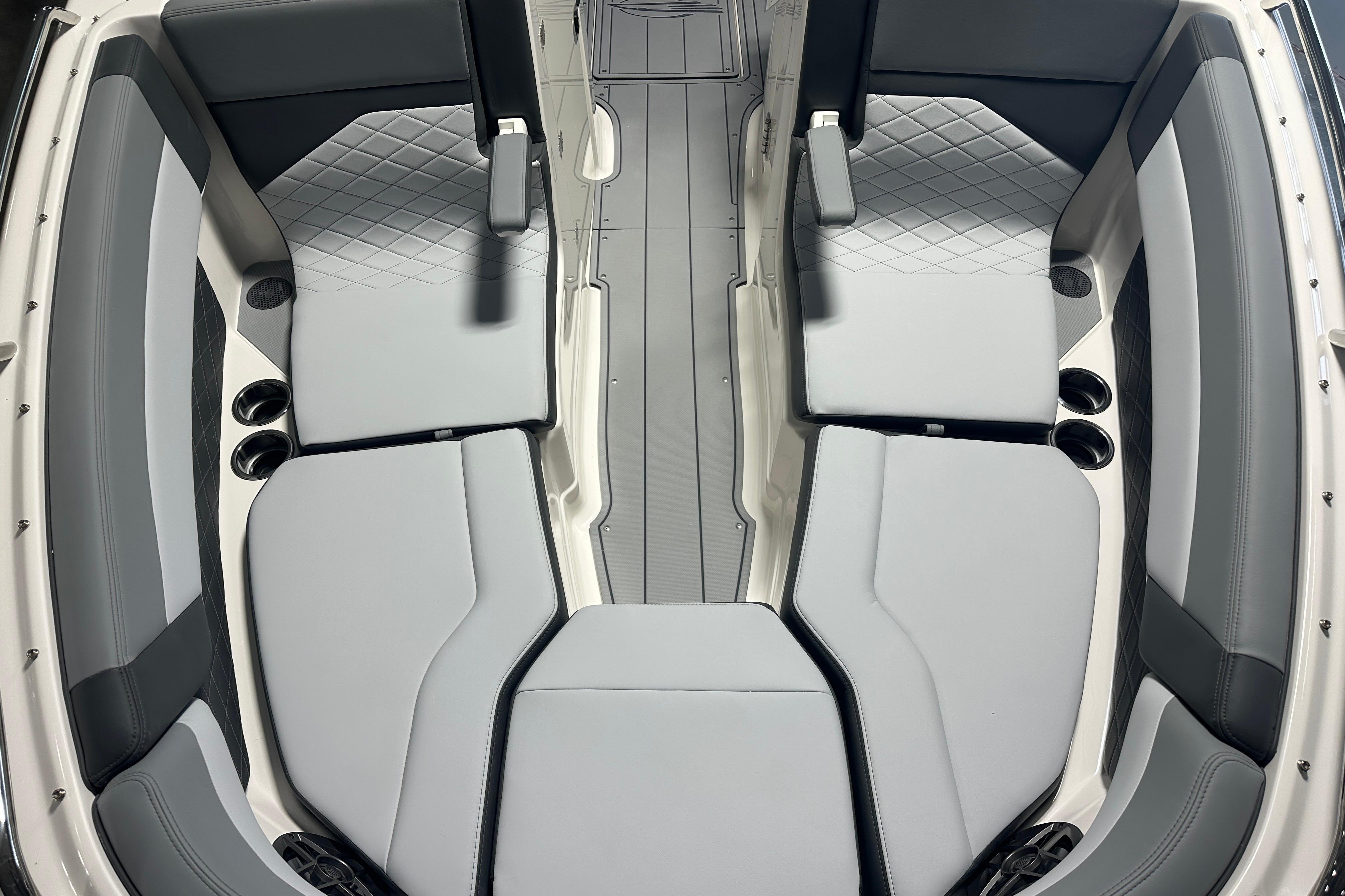 Interior of Chaparral SSX 6 boat, 2026 model, featuring gray upholstery.