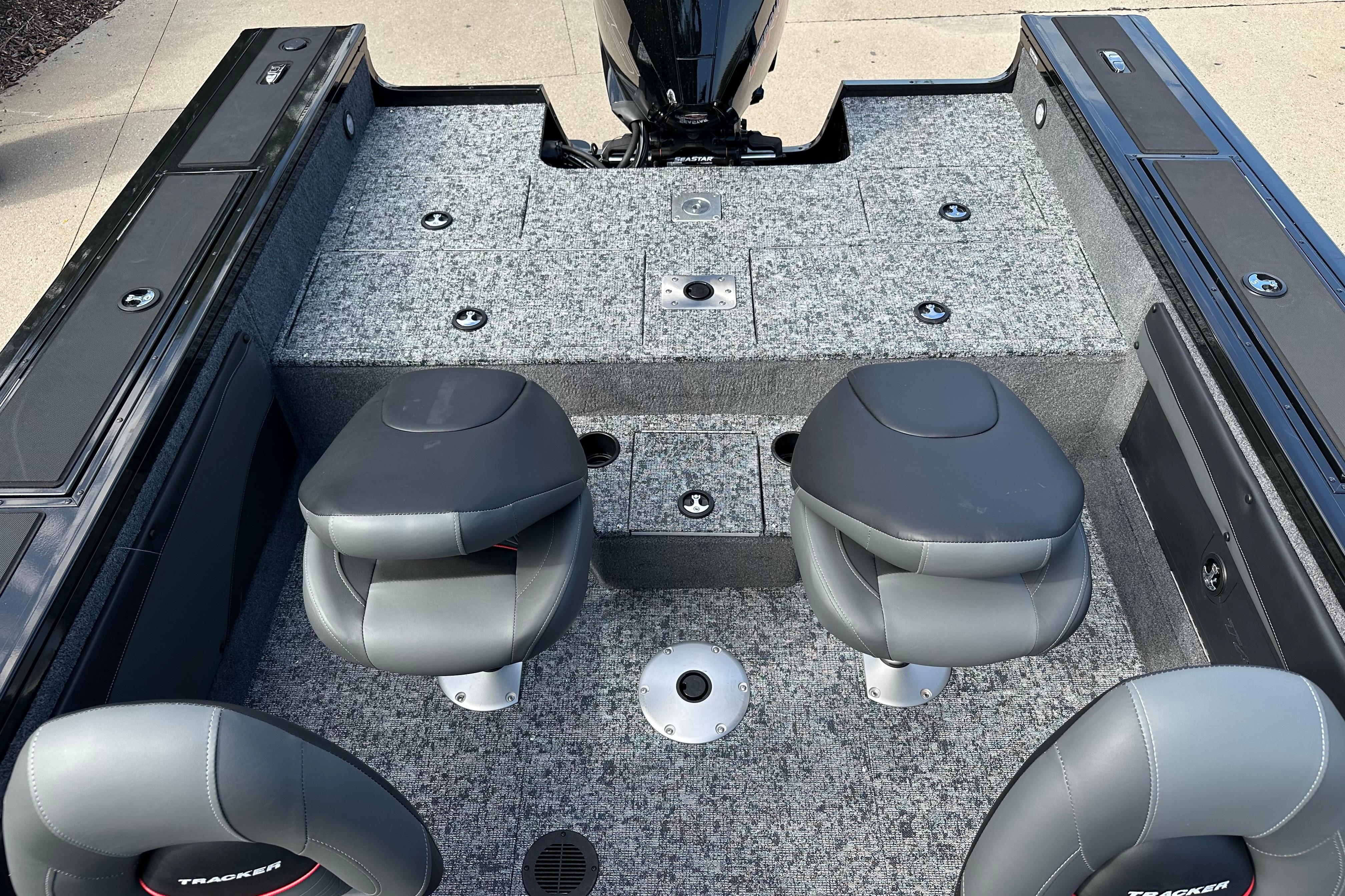 2026 Tracker Targa V-19 WT boat interior with gray seating and carpeted deck.