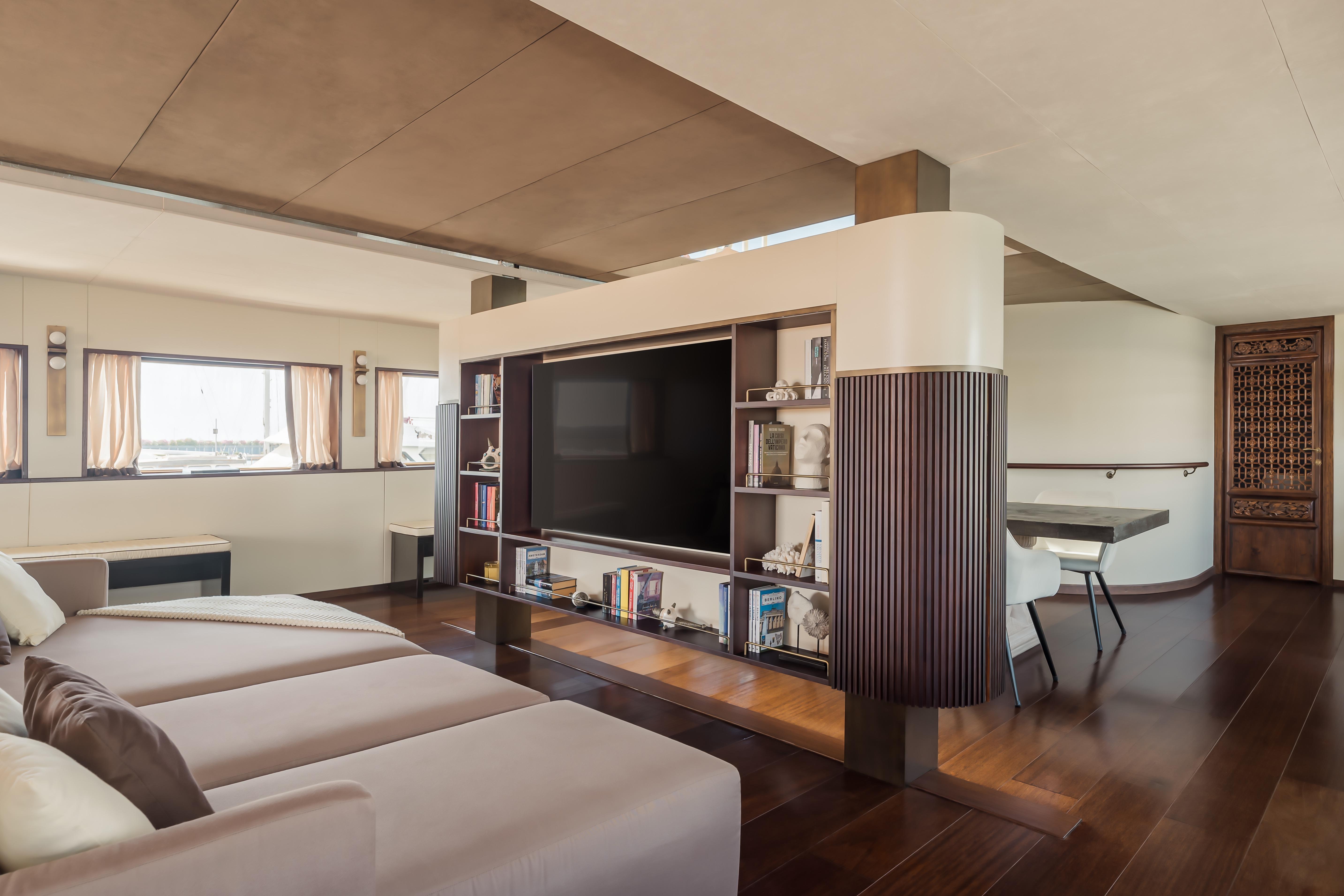 Luxurious interior of a 1956 custom converted tugboat with modern furnishings and elegant decor.