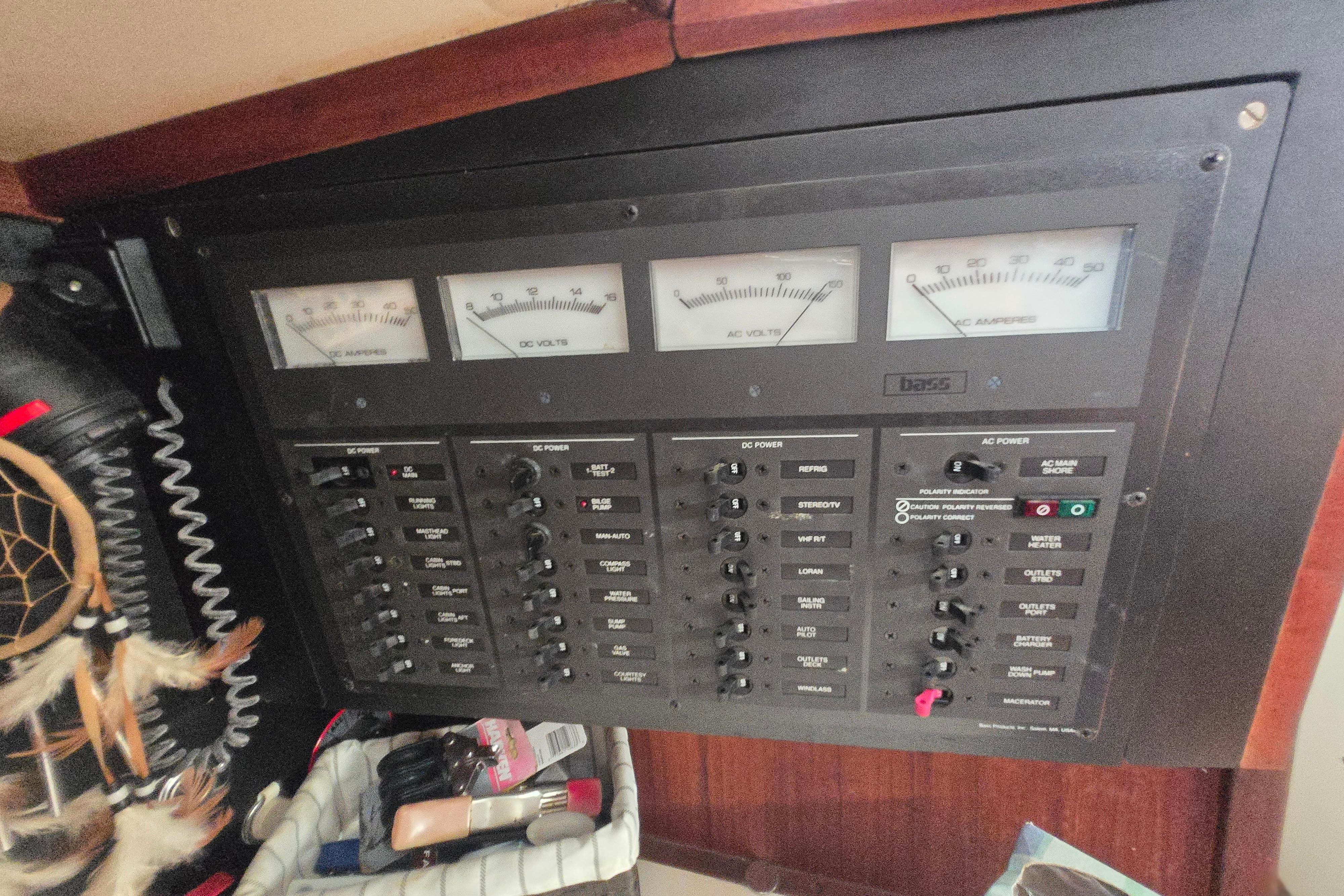 Electrical panel on a 1988 Sabre 38 boat with gauges and switches.