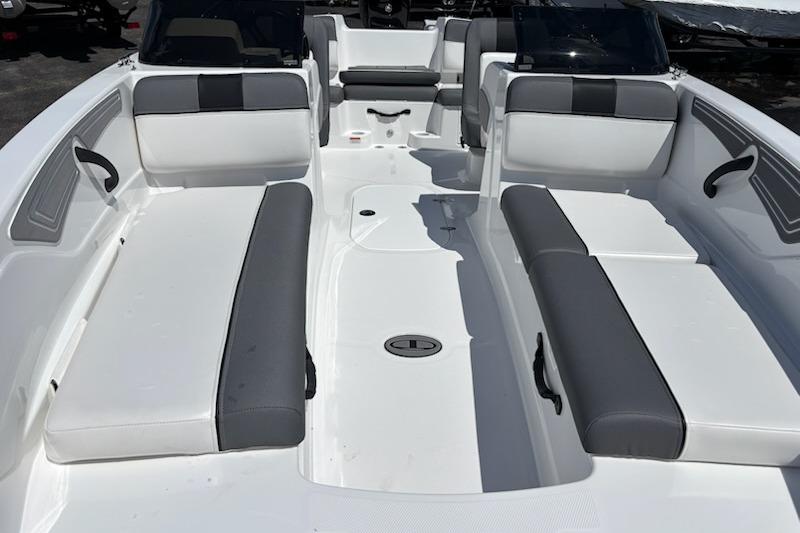 2026 Tahoe T21 boat interior with white and gray seating, spacious layout.