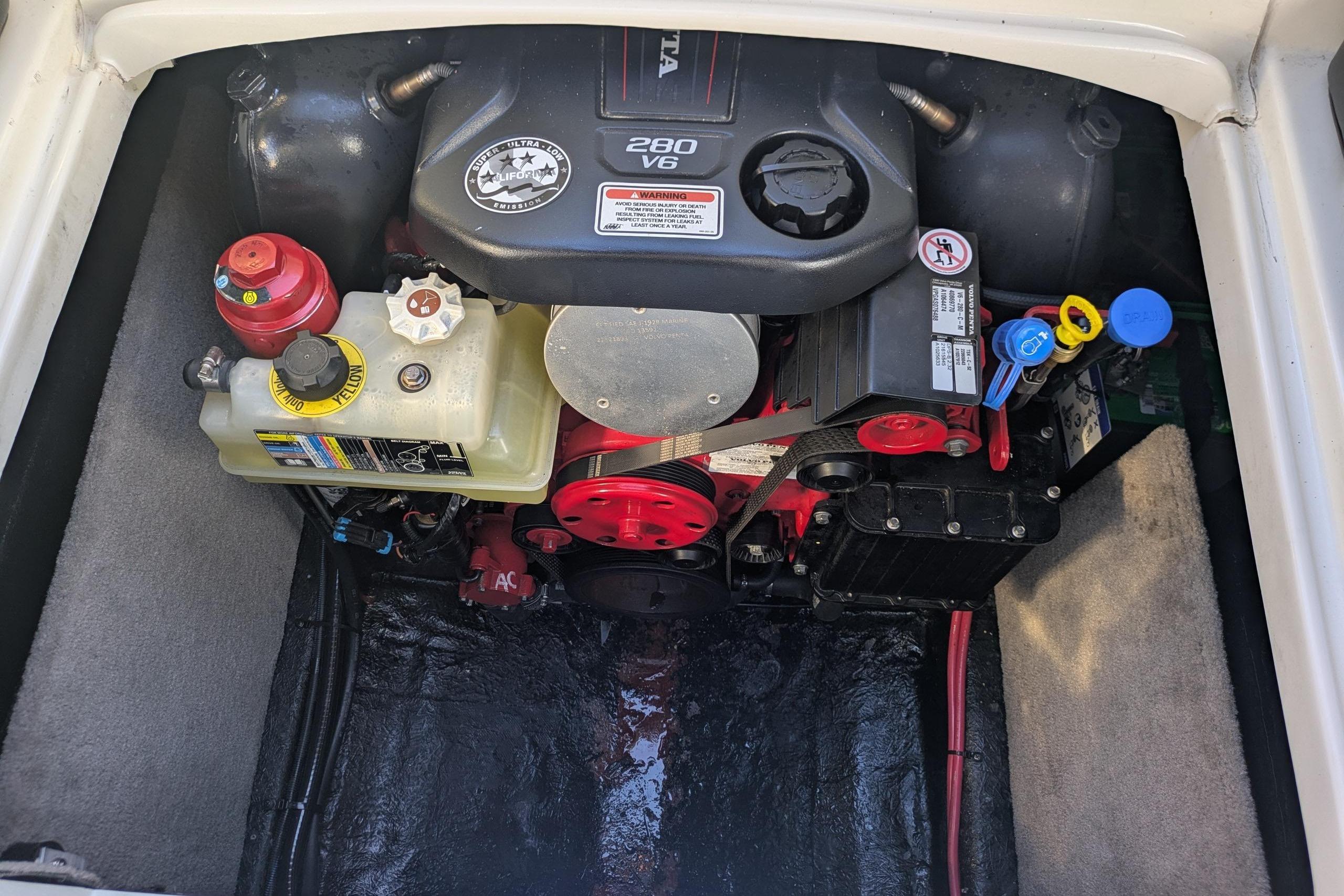 Engine compartment of a 2019 Stingray 250 CR boat, featuring a 280 V6 engine.
