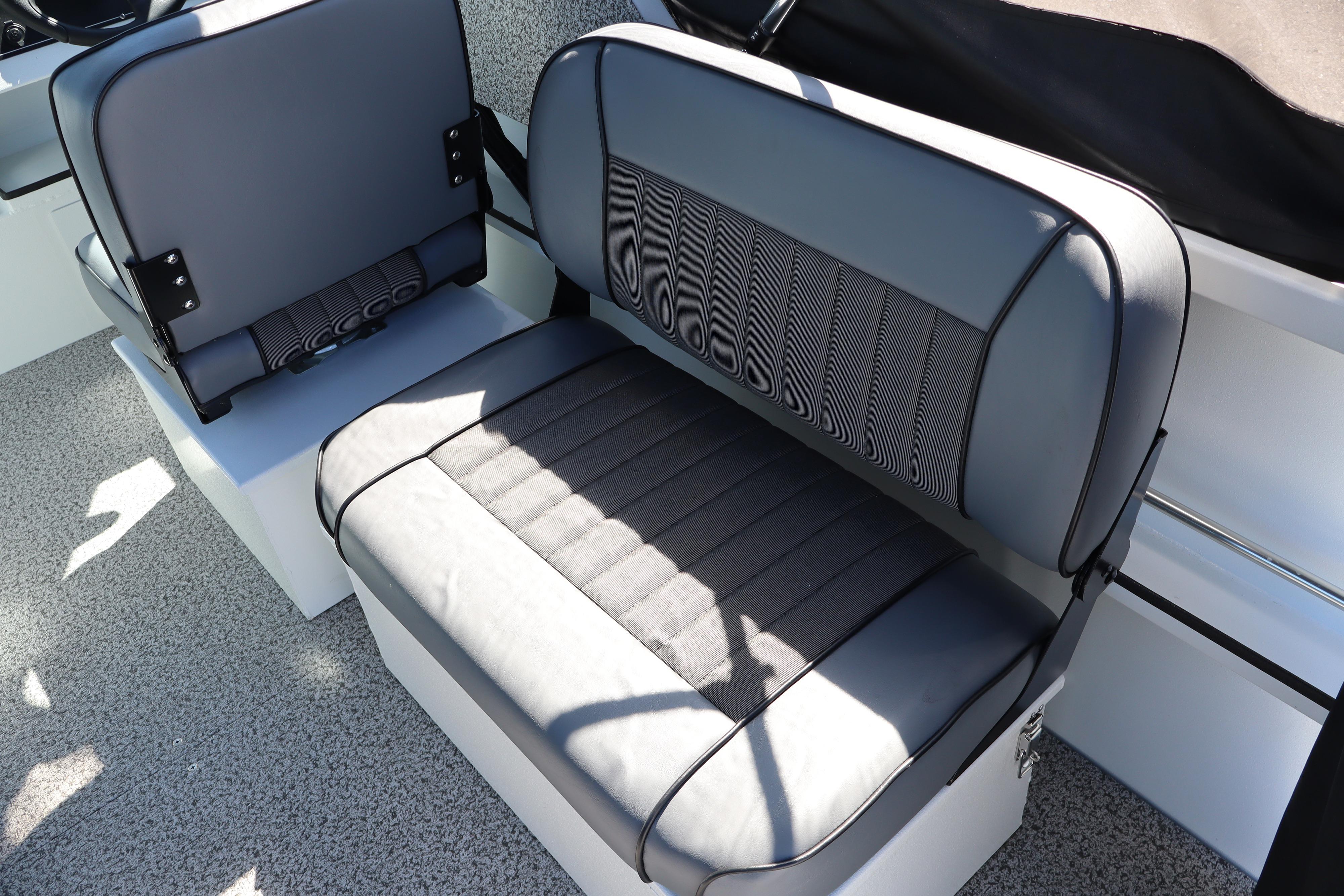 2026 Alumaweld Stryker 202 boat interior with gray cushioned seating.