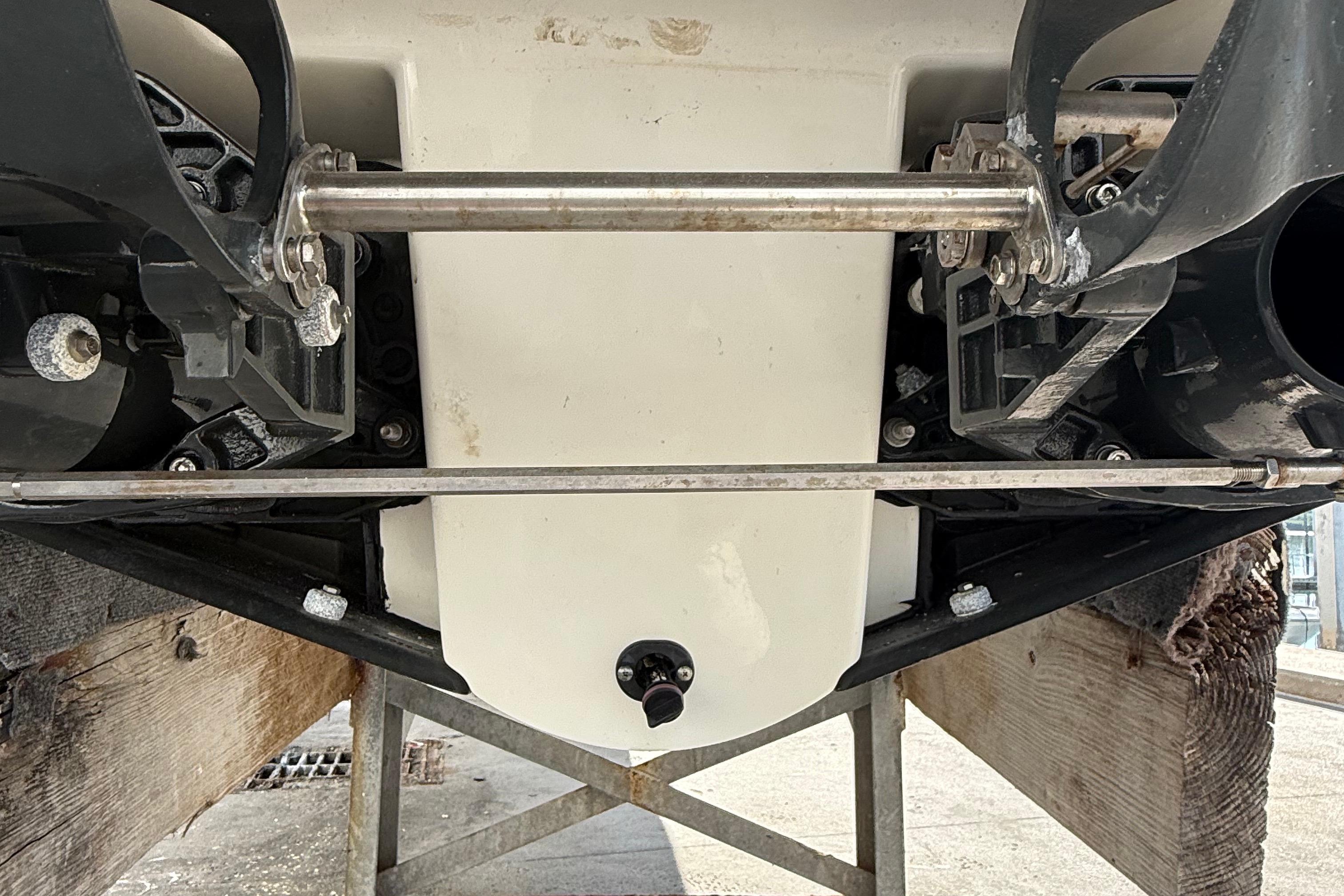 Underneath view of a 2021 Scarab 255 ID boat, showcasing its dual jet propulsion system.