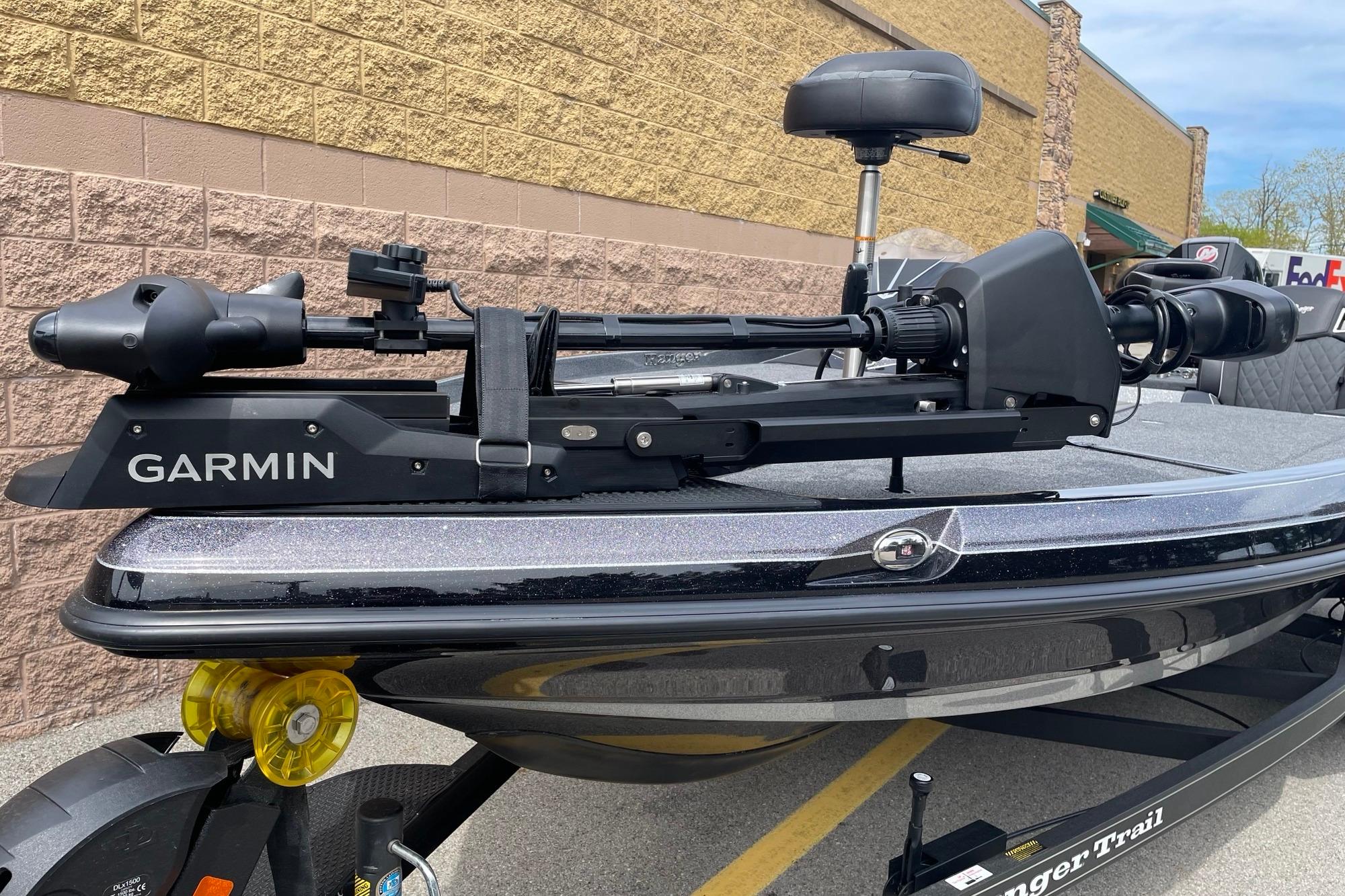 2026 Ranger Z520R boat with Garmin trolling motor, parked outdoors.