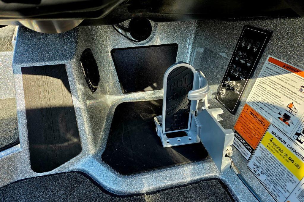 Interior of 2026 Skeeter ZXE20 boat showing foot pedal and control panel.