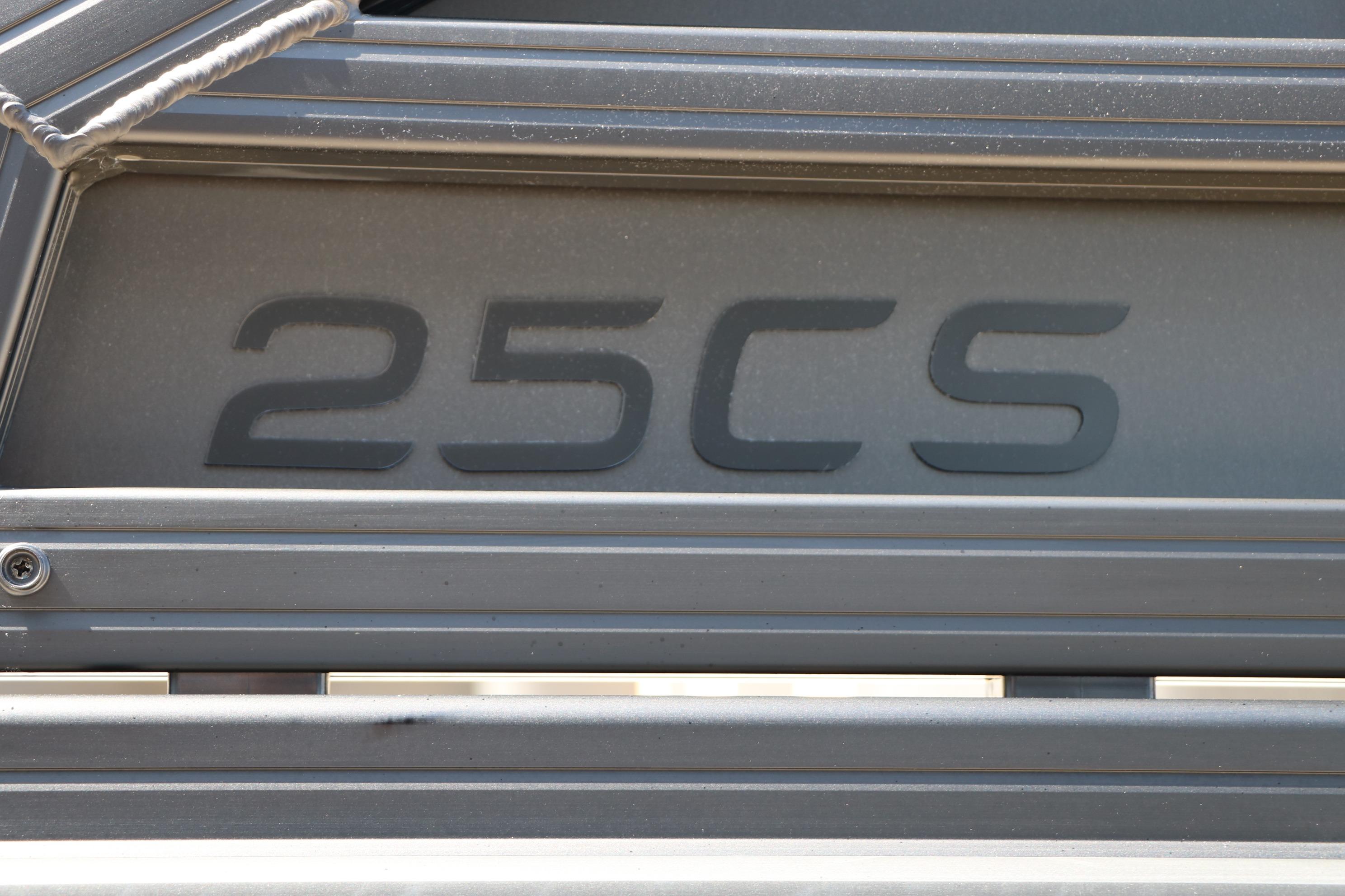 Close-up of 2026 Evotti 725 CS Tri-Toon boat model number '25CS' in sleek design.