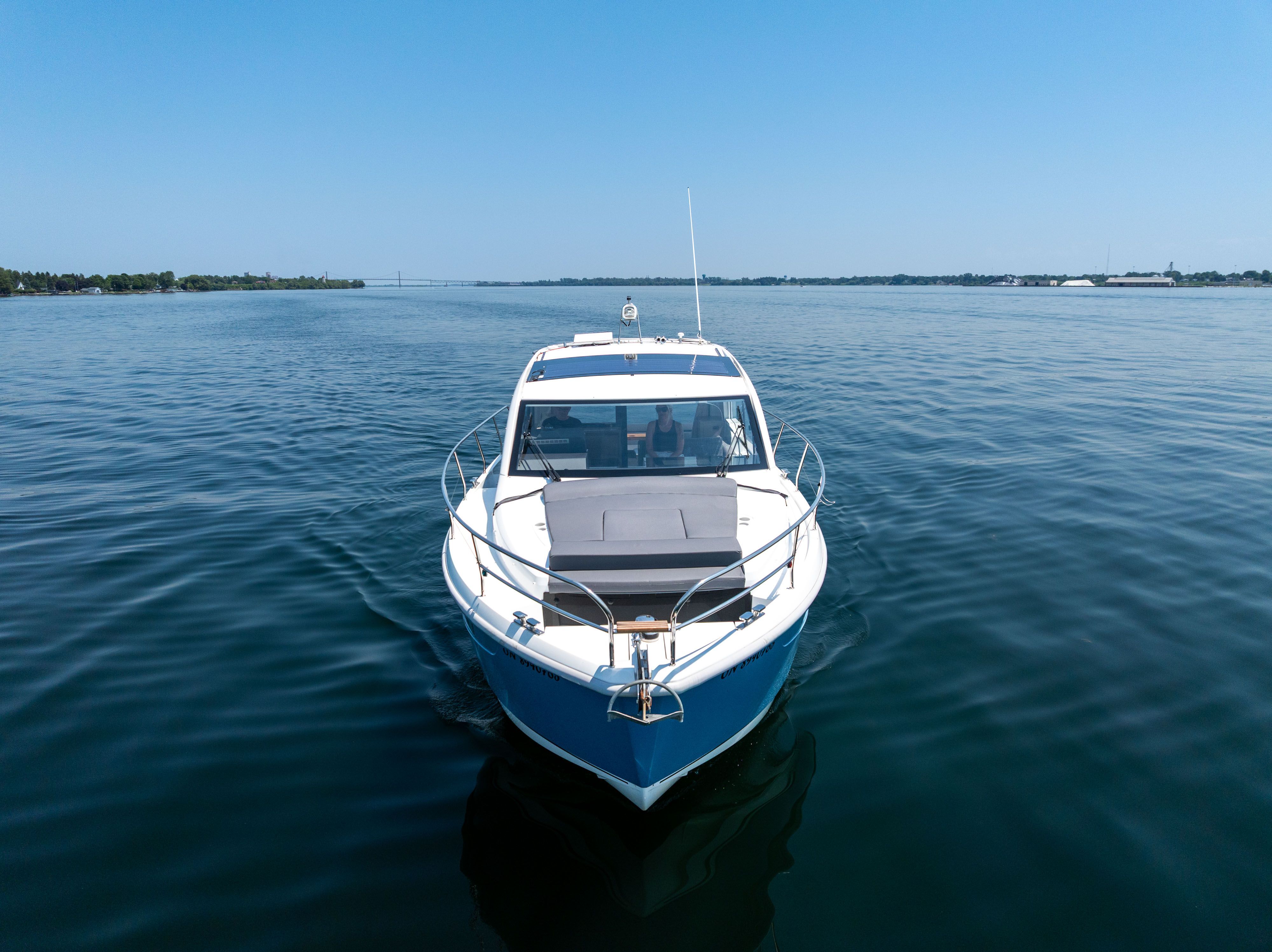 2023 Sealine C335V on calm water.