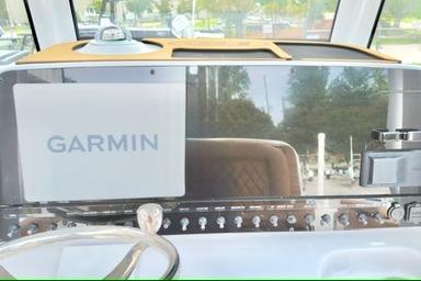 Dashboard of 2026 Sea Hunt Ultra 255 SE with Garmin navigation system.