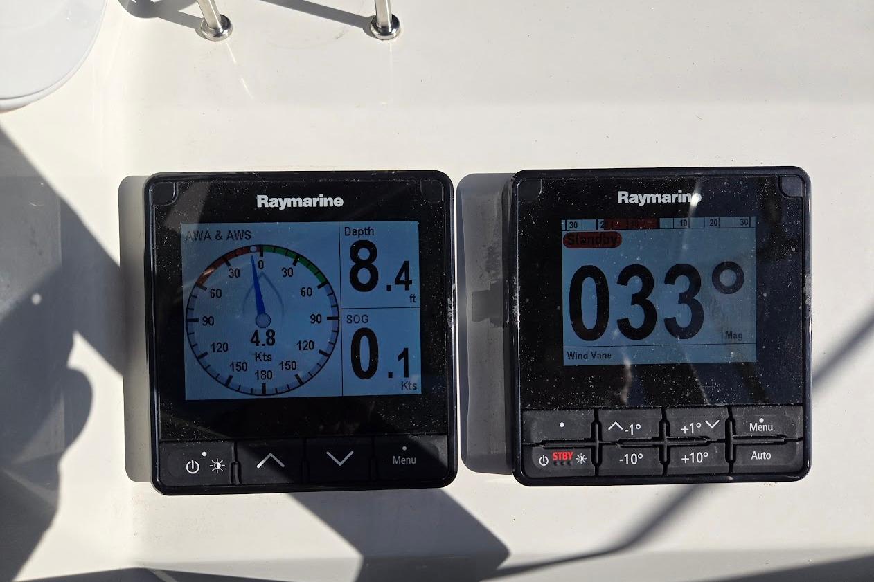 Raymarine instruments on 2023 Beneteau Oceanis 38.1 displaying depth and wind direction.