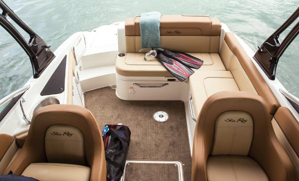 Manufacturer Provided Image: 2014 Sea Ray 260 Sundeck interior with tan seating and boating accessories.