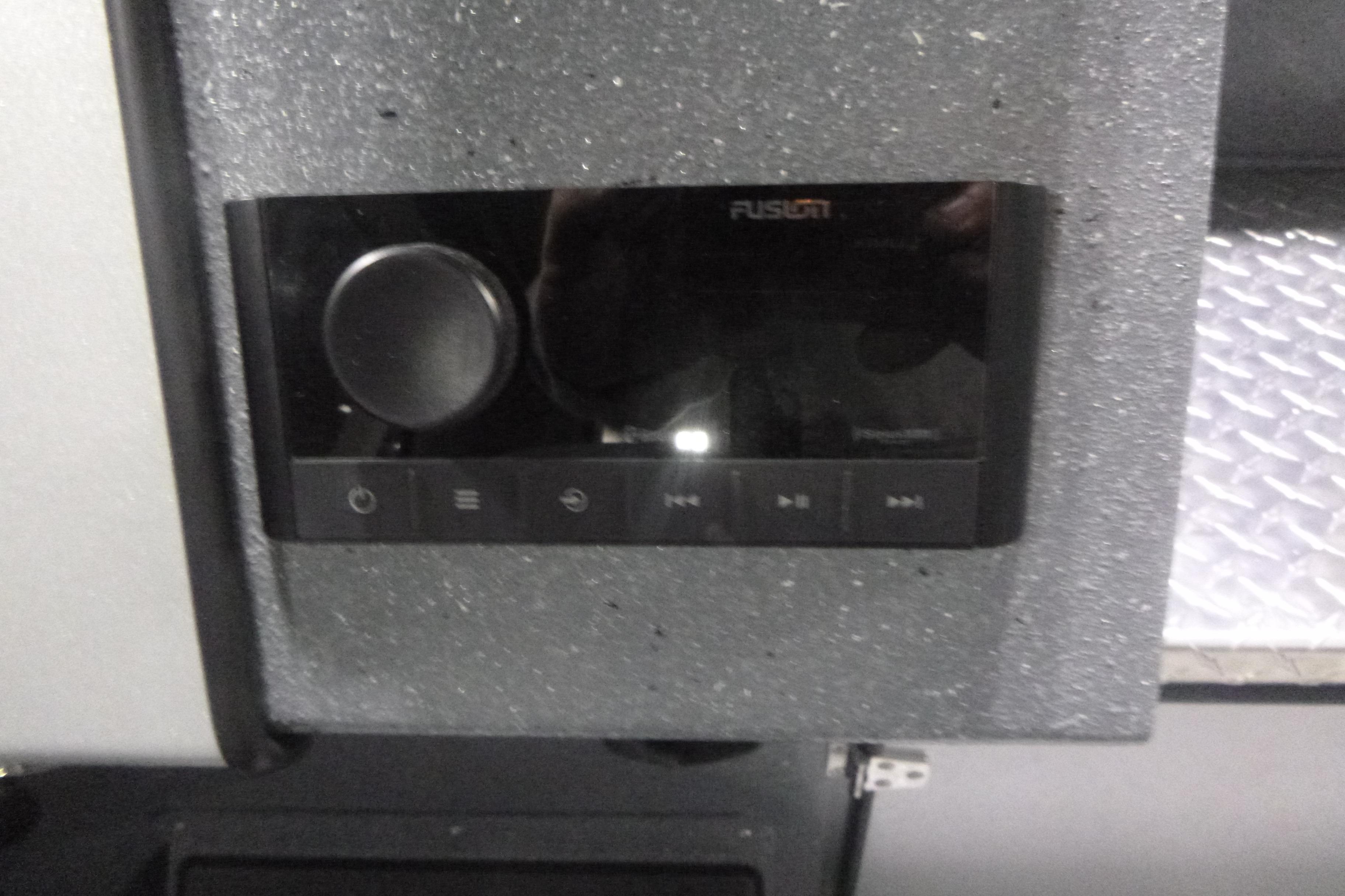 Audio control panel in 2026 KingFisher 2425 Escape HT boat interior.