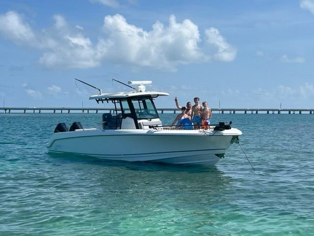 2023 Boston Whaler 330 Outrage on water with passengers.
