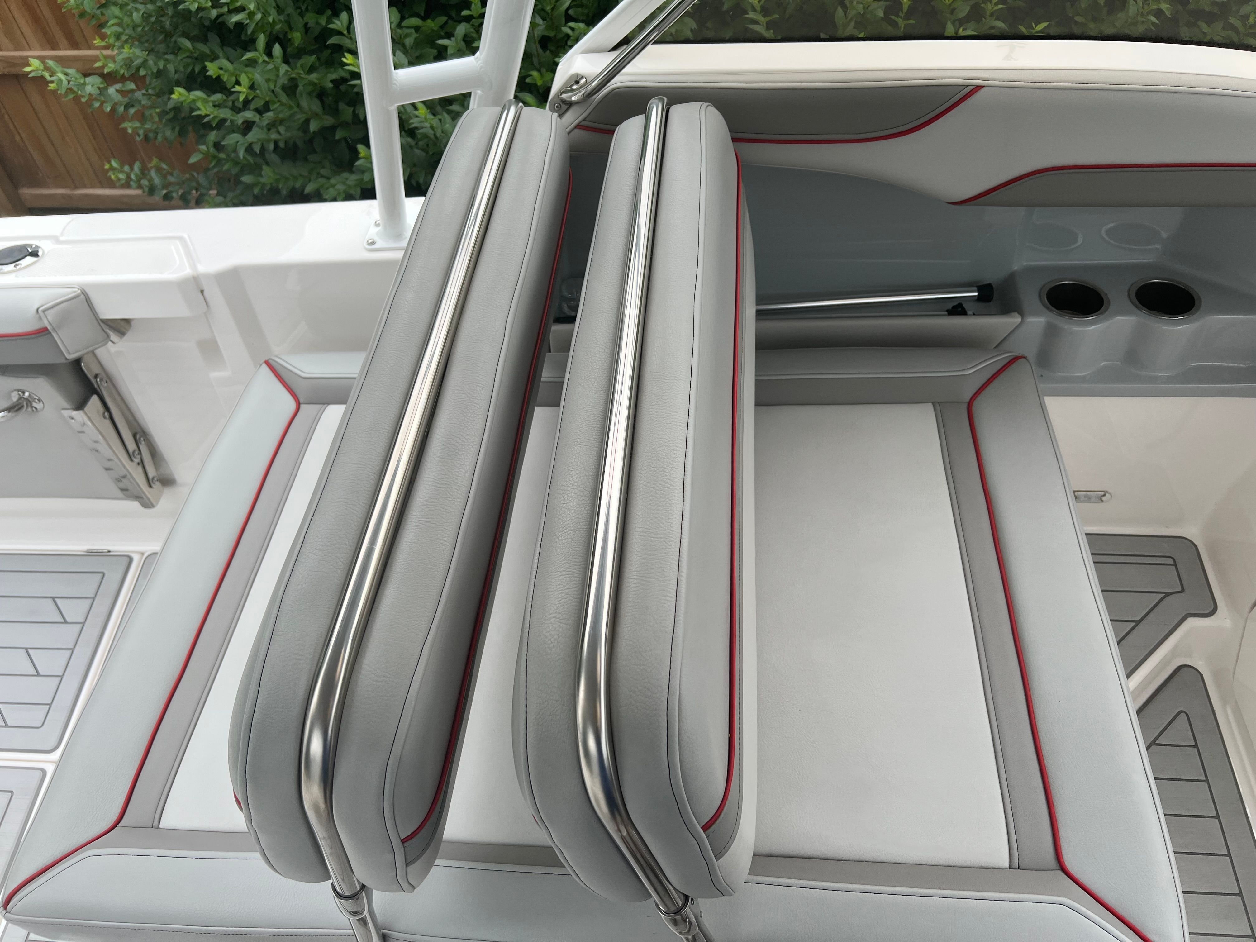 Interior of 2023 Solara S 250DC with gray seats and red accents.