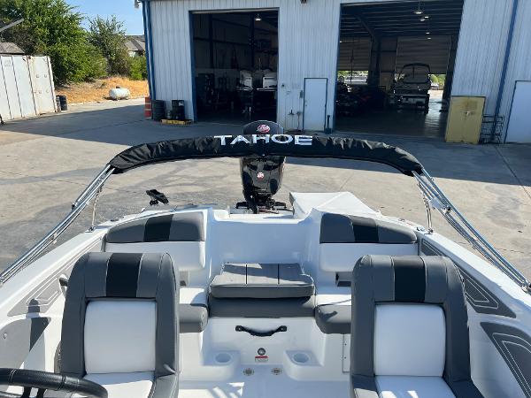 2024 Tahoe T21 boat interior at a marina.
