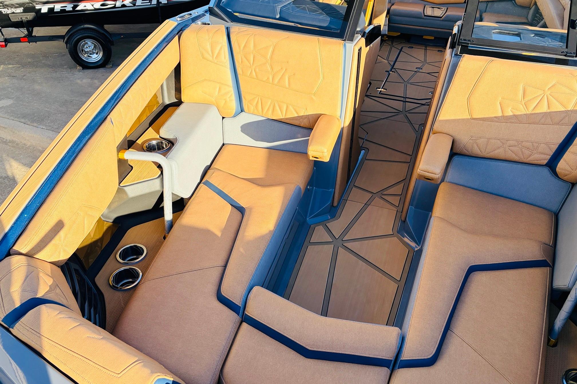 Luxurious interior of 2026 Nautique Super Air Nautique G25 Paragon boat with plush seating.