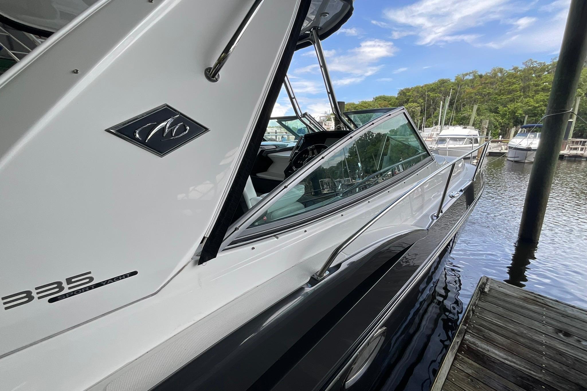 2019 Monterey 335 Sport Yacht docked, showcasing sleek design and modern features.
