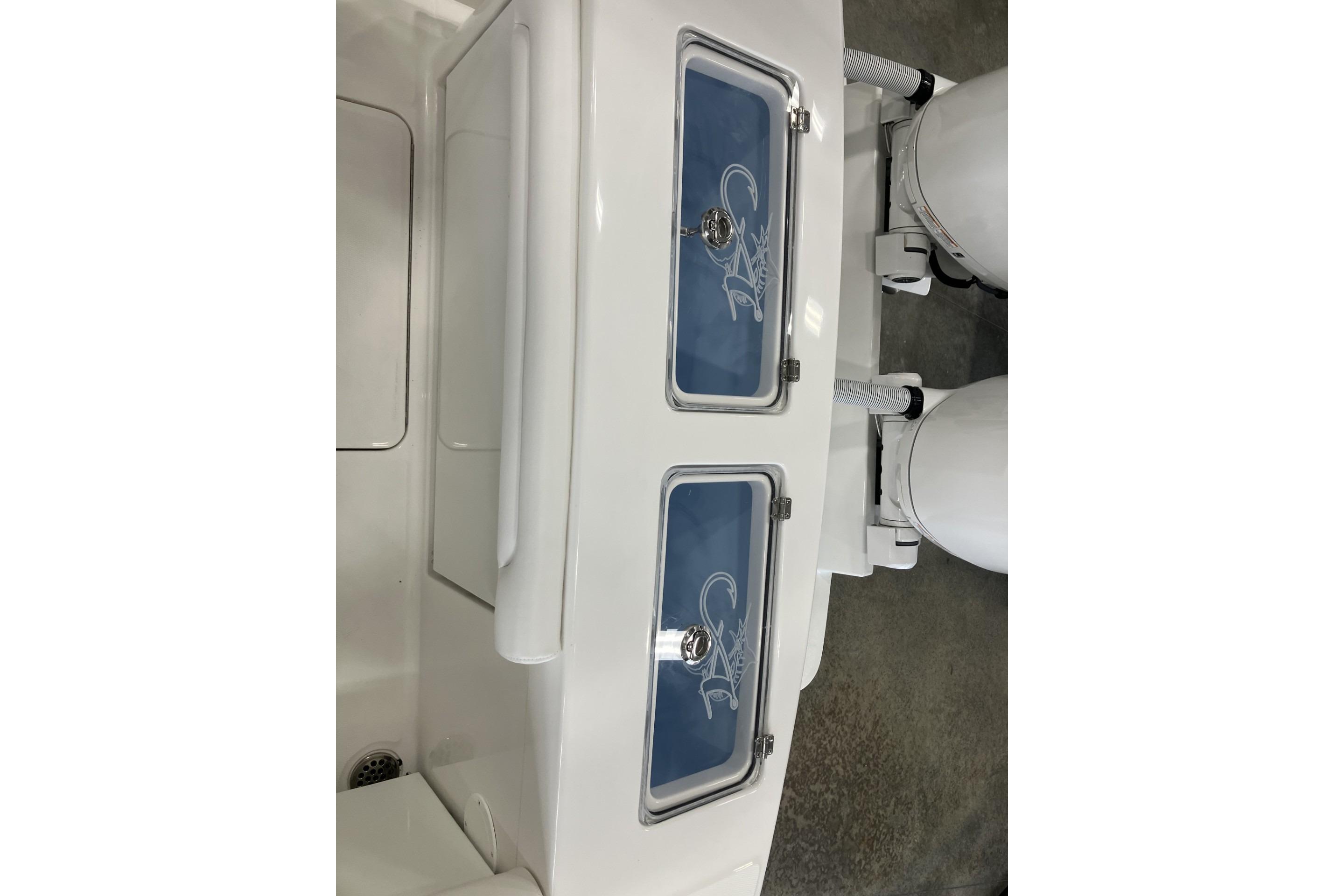 2026 Albemarle 27 Dual Console boat with dual livewells and outboard motors.